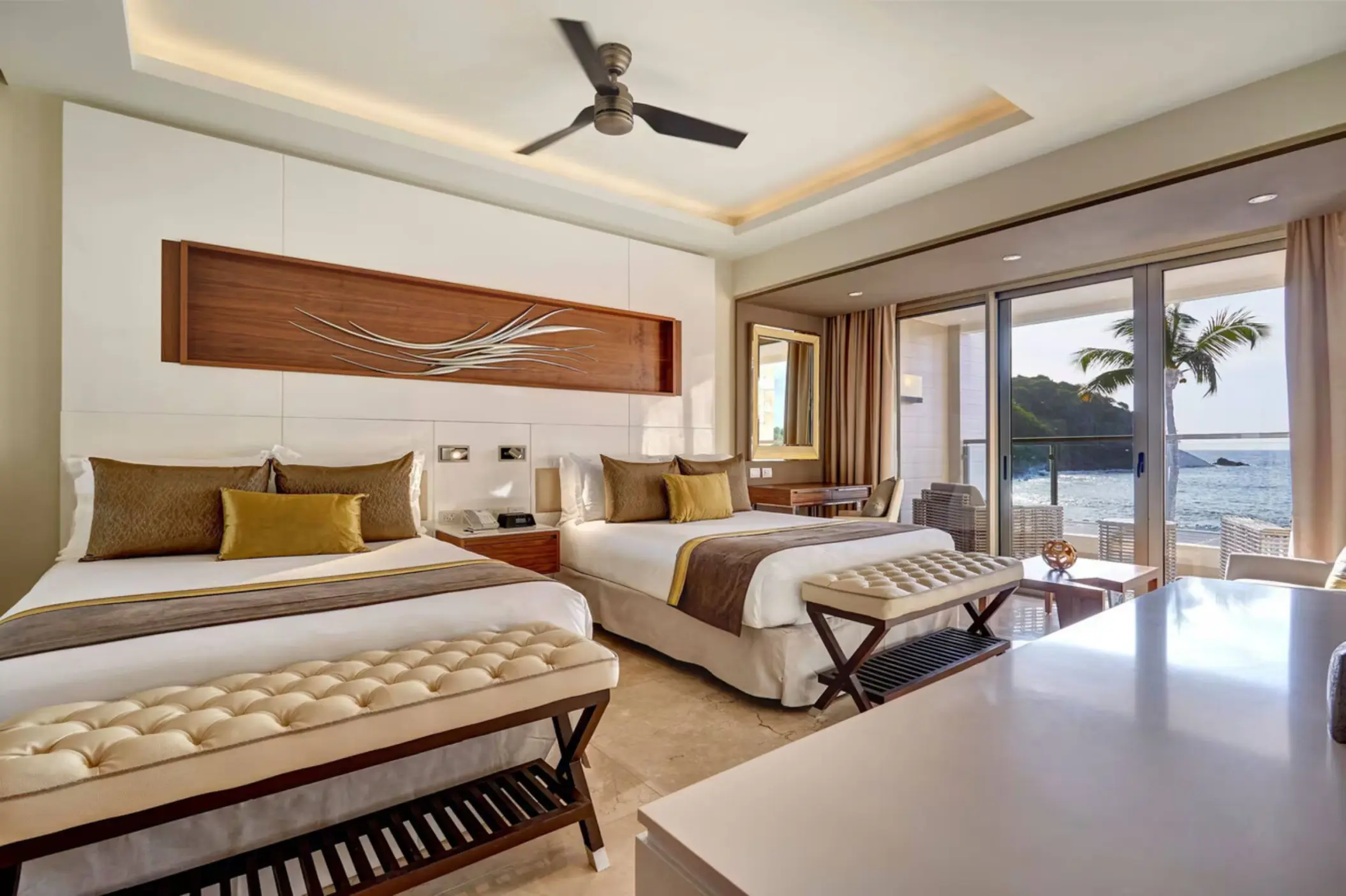 Chairman Suite bedroom with two queen beds and ocean views at Royalton Saint Lucia, Castries