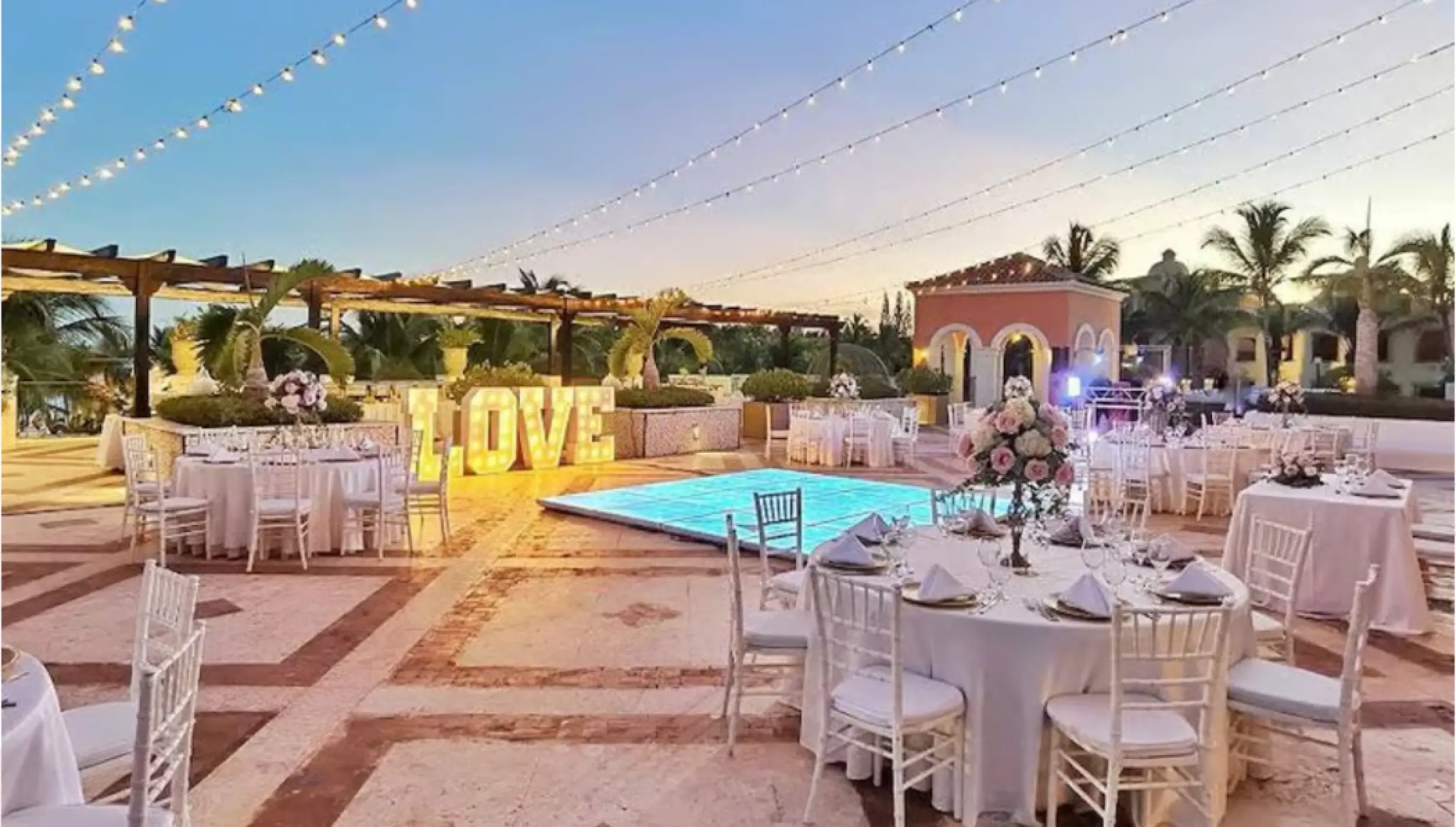 Grand Colonial Terrace wedding reception with string lights and dance floor at Sanctuary Cap Cana, Punta Cana