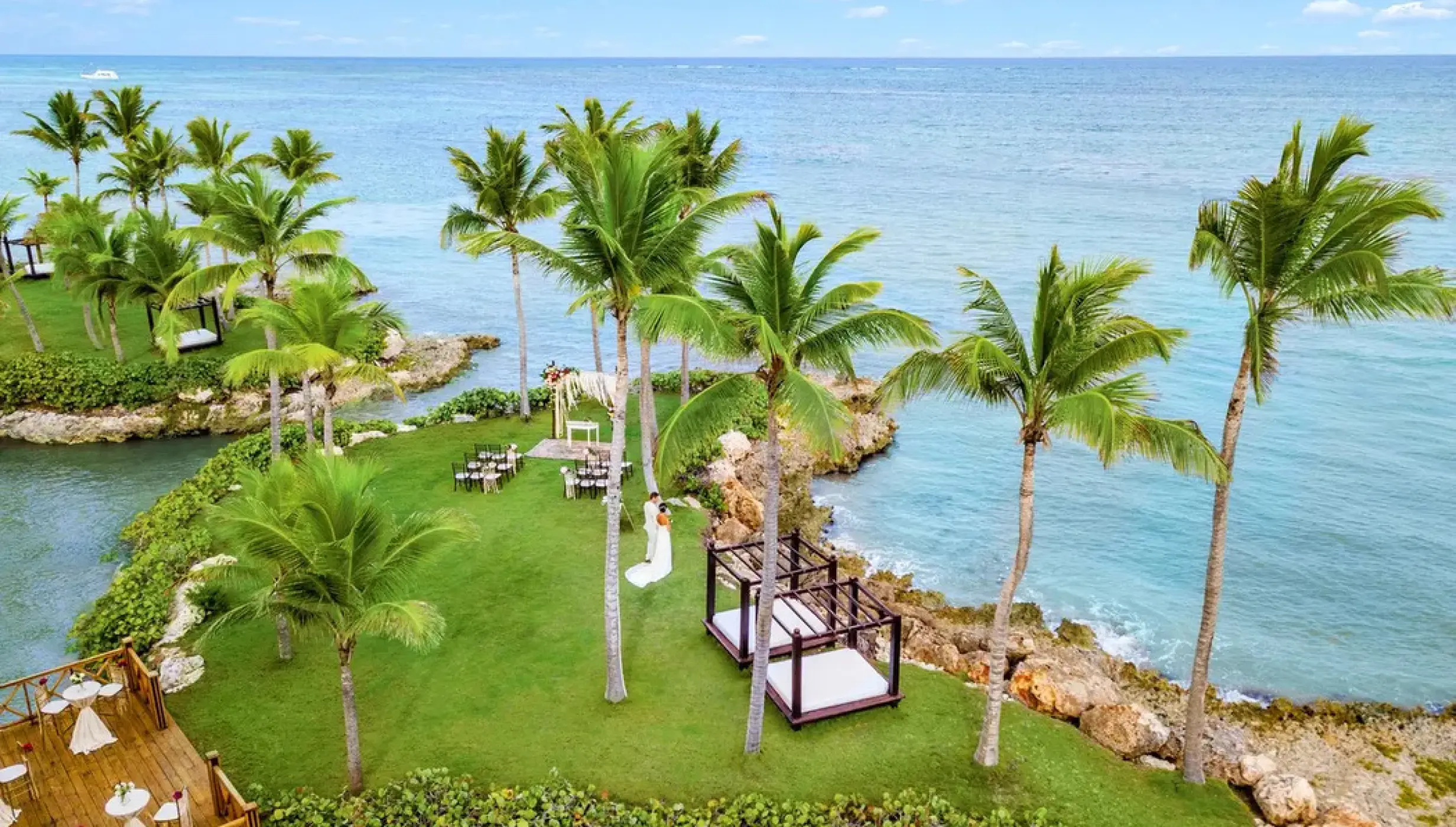 Aerial view of a garden wedding ceremony on a private island at Sanctuary Cap Cana, Punta Cana