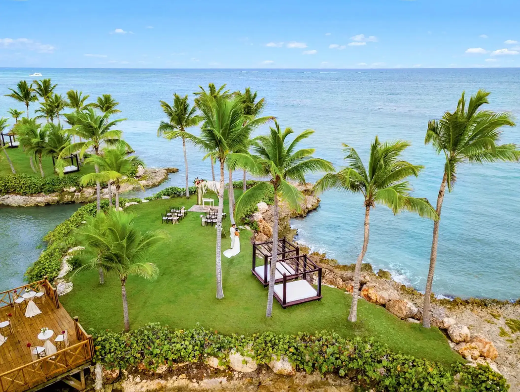 Aerial view of a garden wedding ceremony on a private island at Sanctuary Cap Cana, Punta Cana