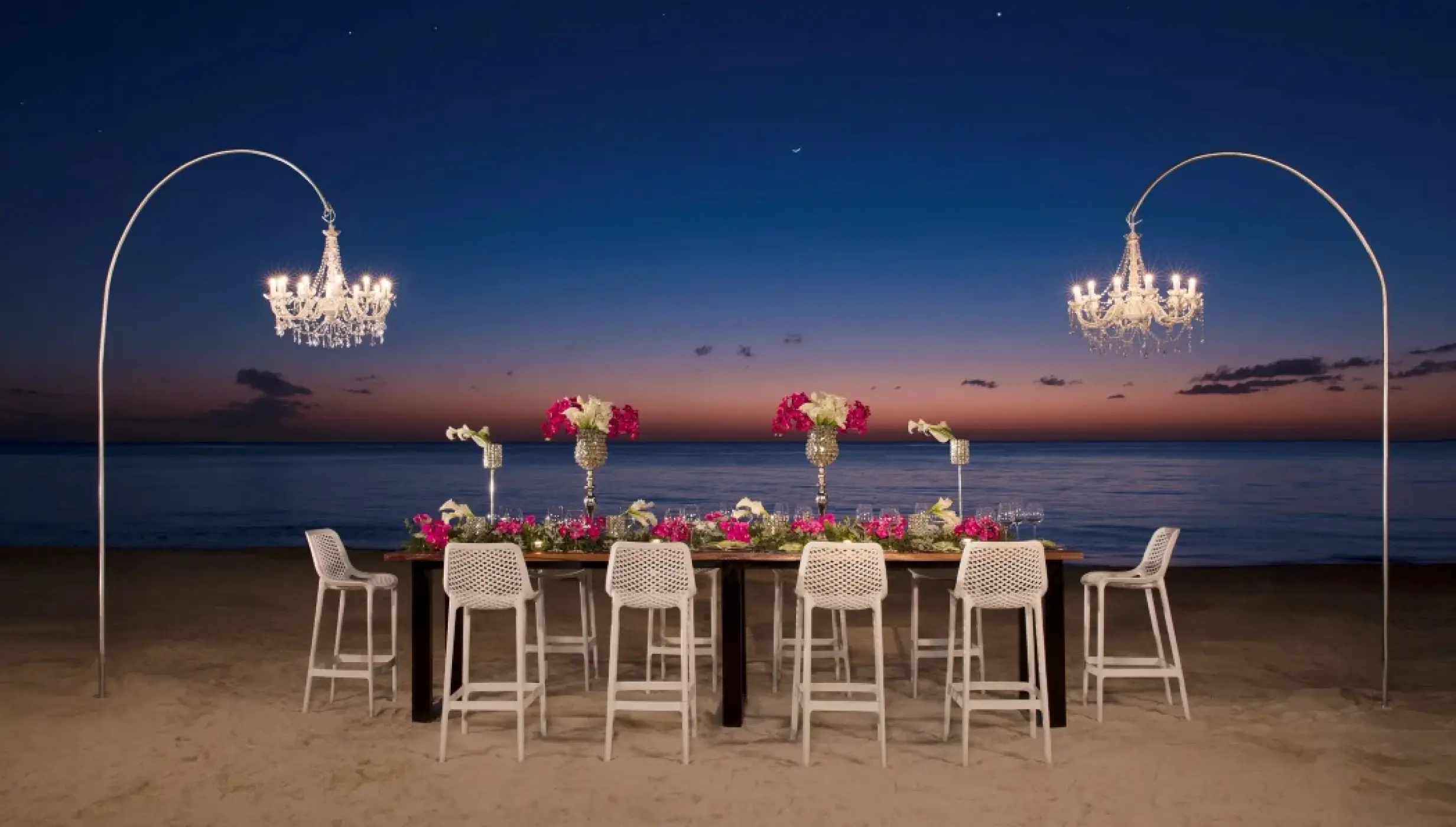 beach venue reception setup at Secrets Aura Cozumel