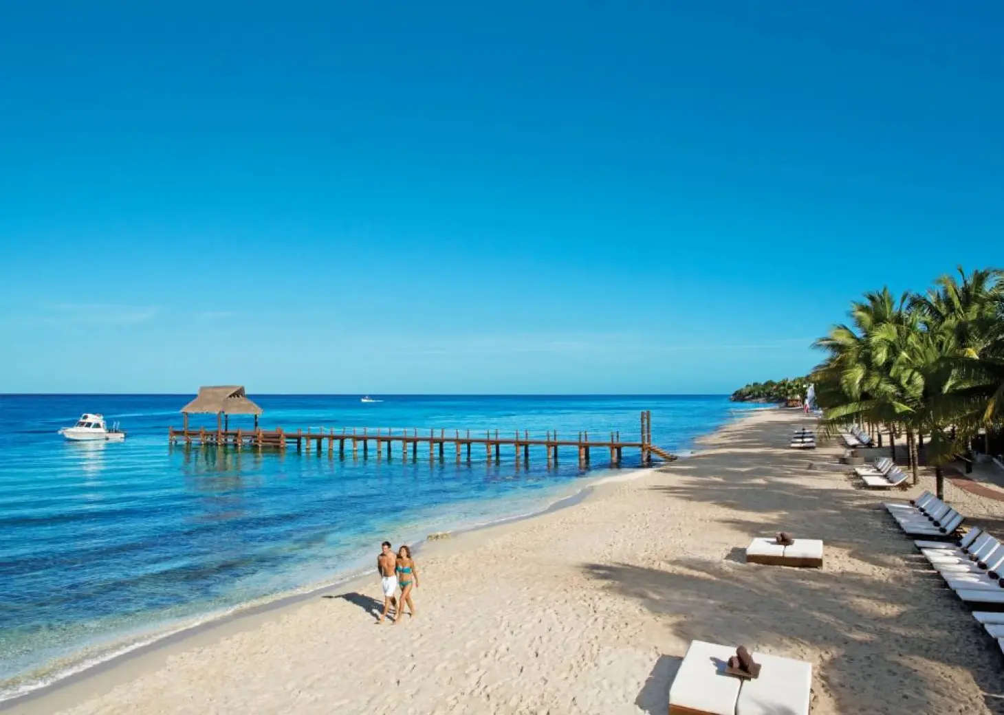 couple on the beach at Secrets Aura Cozumel