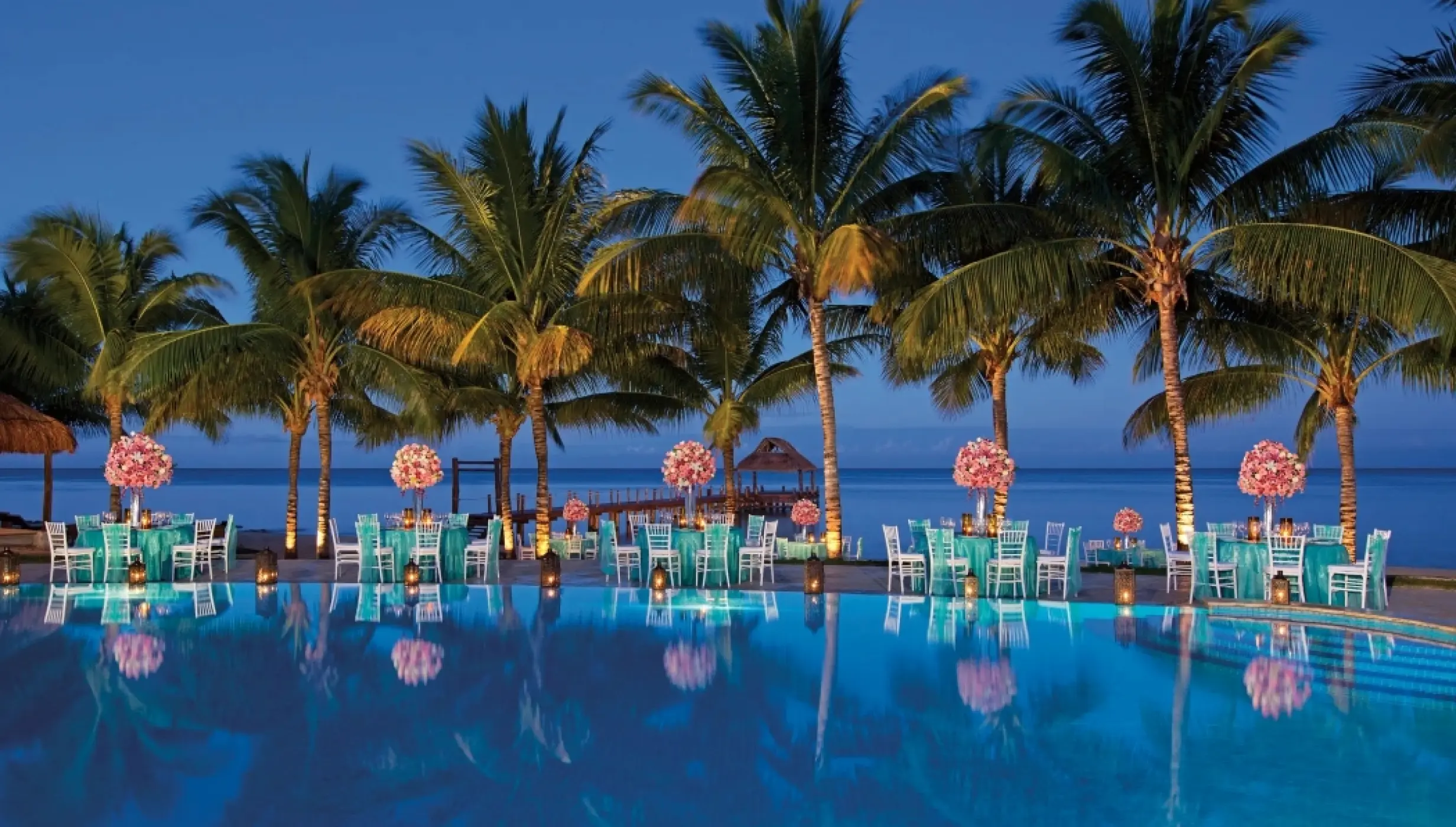 Poolside wedding reception at Secrets Aura Cozumel, Cozumel
