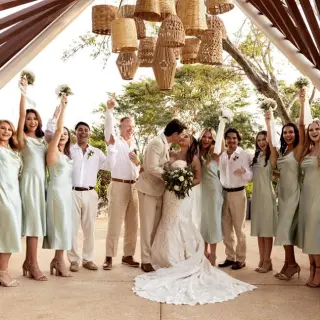 Wedding party cheering for a bride and groom's kiss at Secrets Bahia Mita, Puerto Vallarta