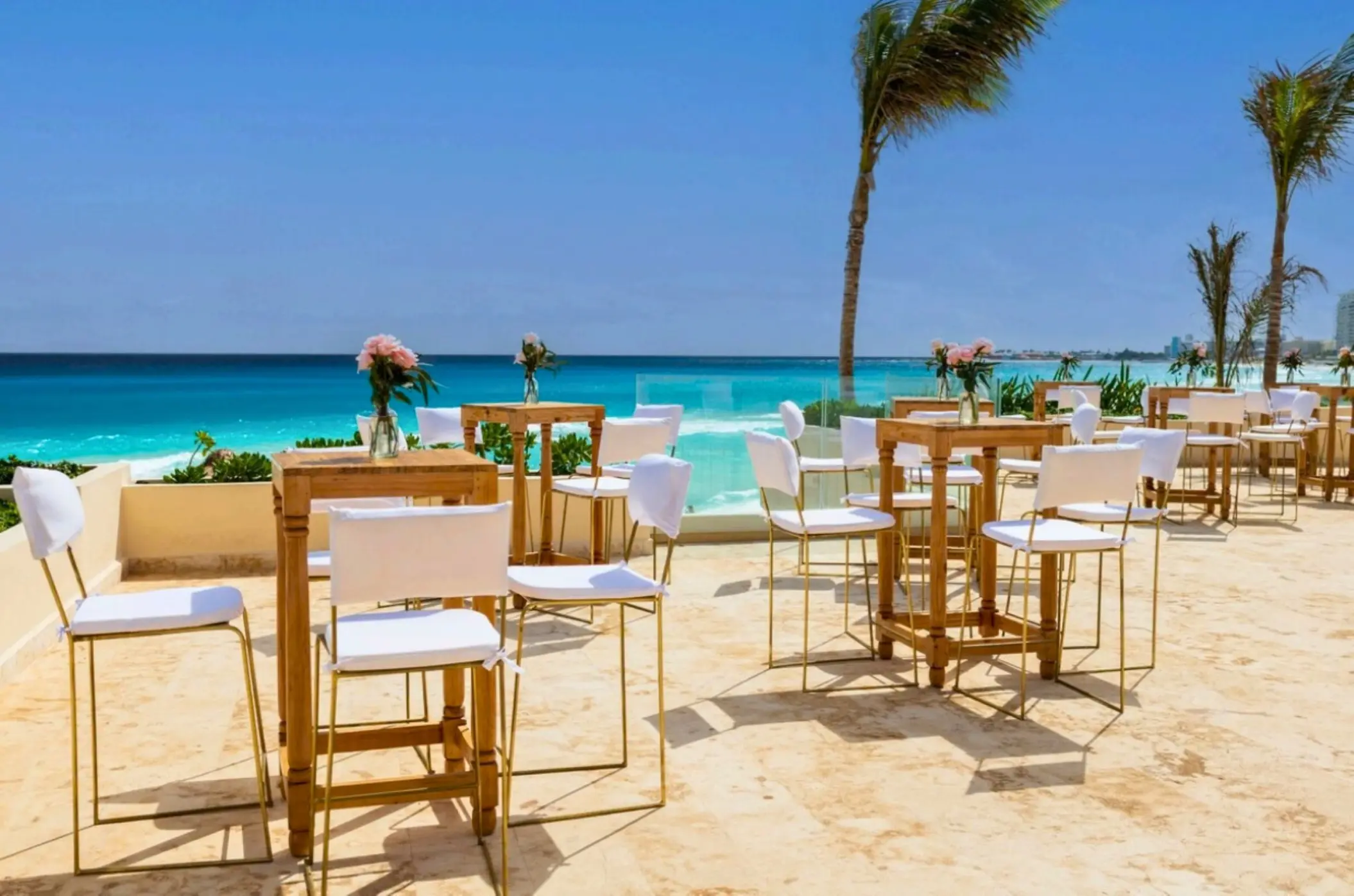 Beachfront terrace wedding reception at Secrets Mirabel, Cancun