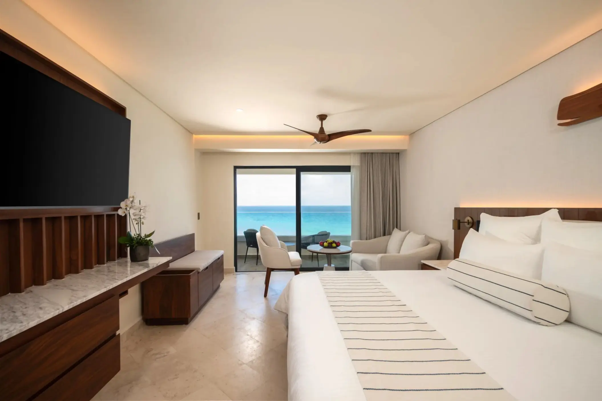Deluxe ocean view suite with balcony overlooking the Caribbean at Secrets Mirabel, Cancun