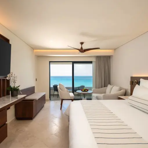 Deluxe ocean view suite with balcony overlooking the Caribbean at Secrets Mirabel, Cancun