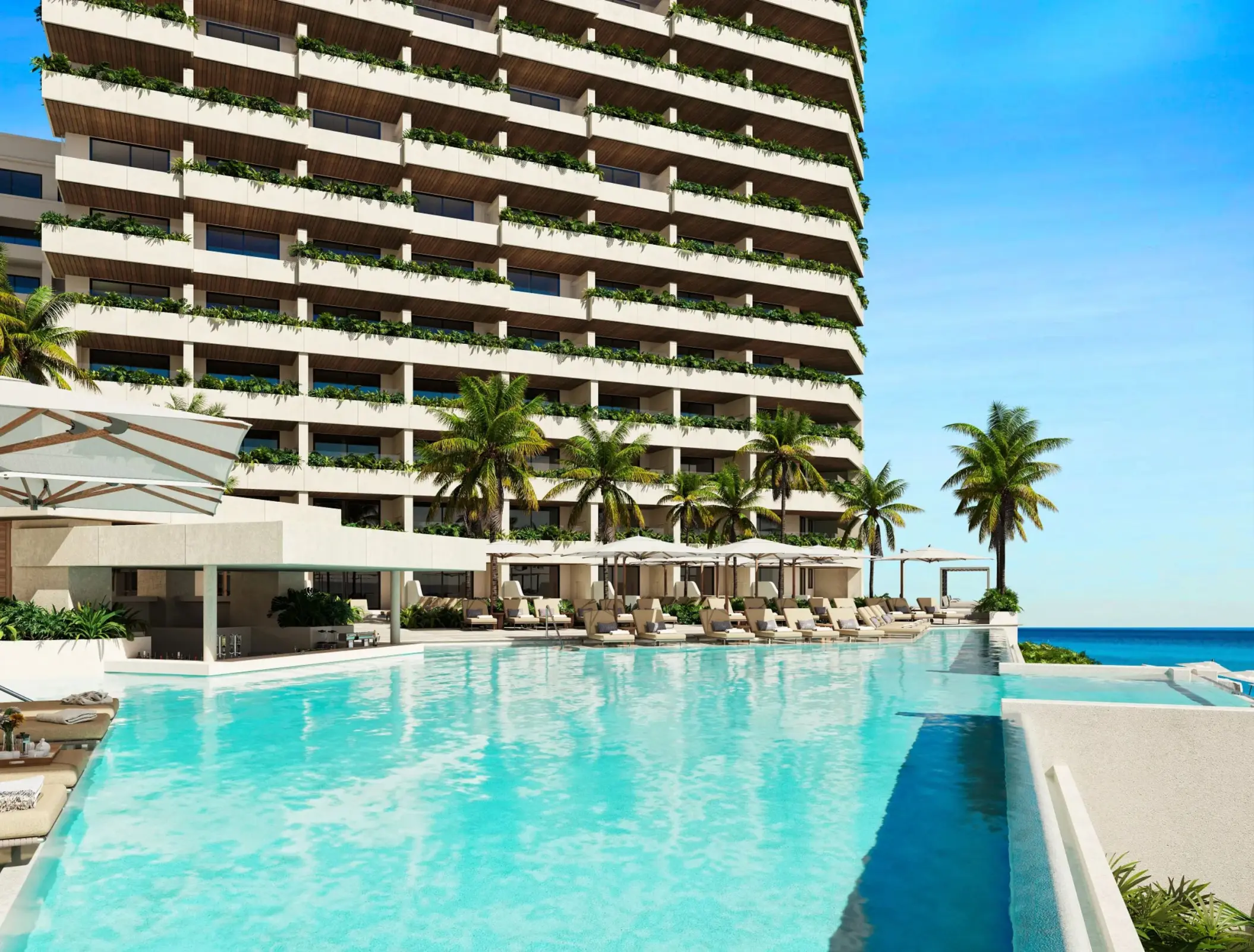 Oceanview infinity pool and resort exterior at Secrets Mirabel, Cancun
