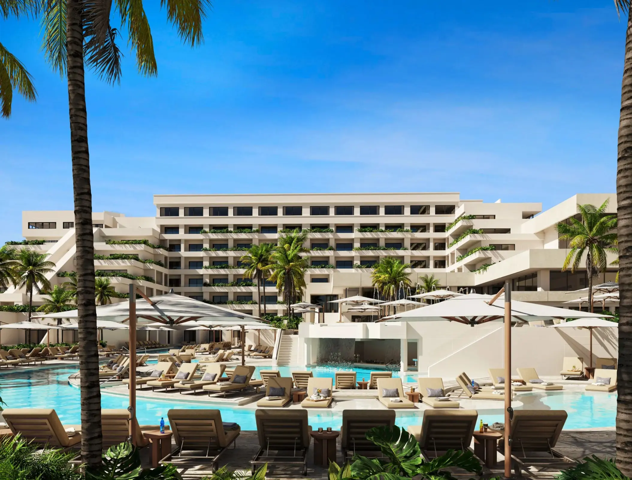 Secrets Mirabel accommodations and outdoor pool with lounge chairs, Cancun