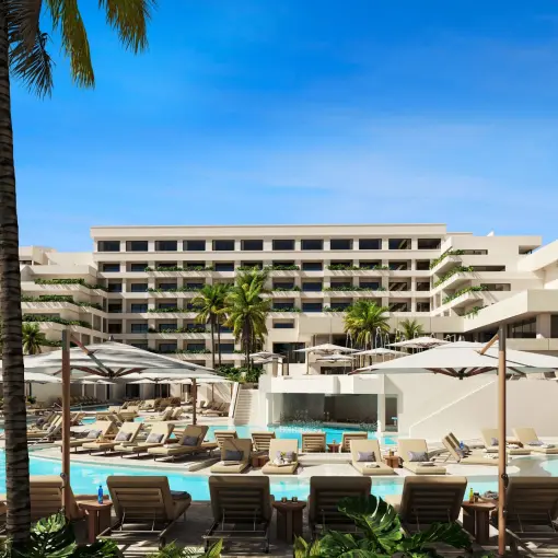 Secrets Mirabel accommodations and outdoor pool with lounge chairs, Cancun