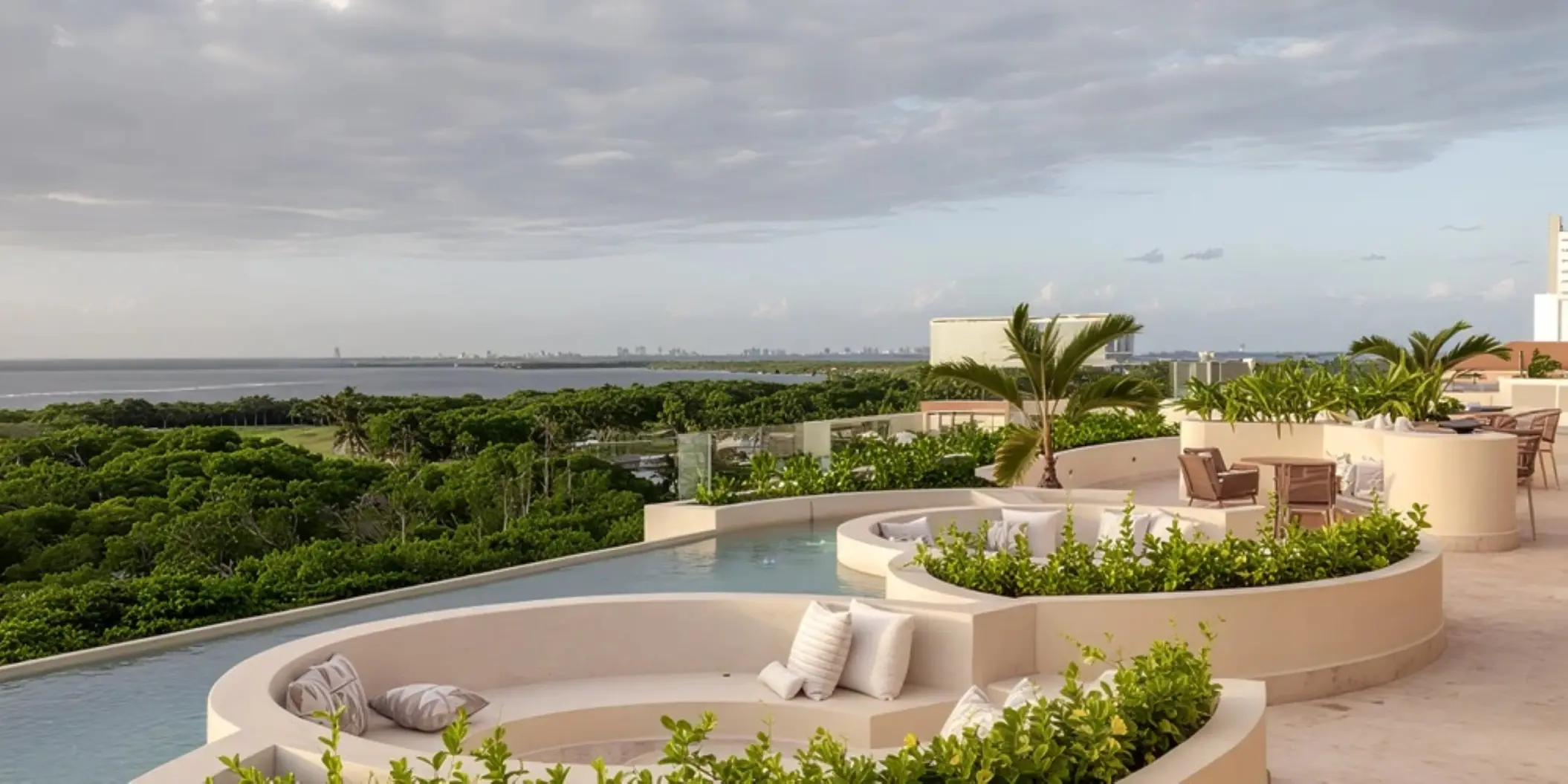 Sky bar venue with lounge seating and ocean views at Secrets Mirabel, Cancun