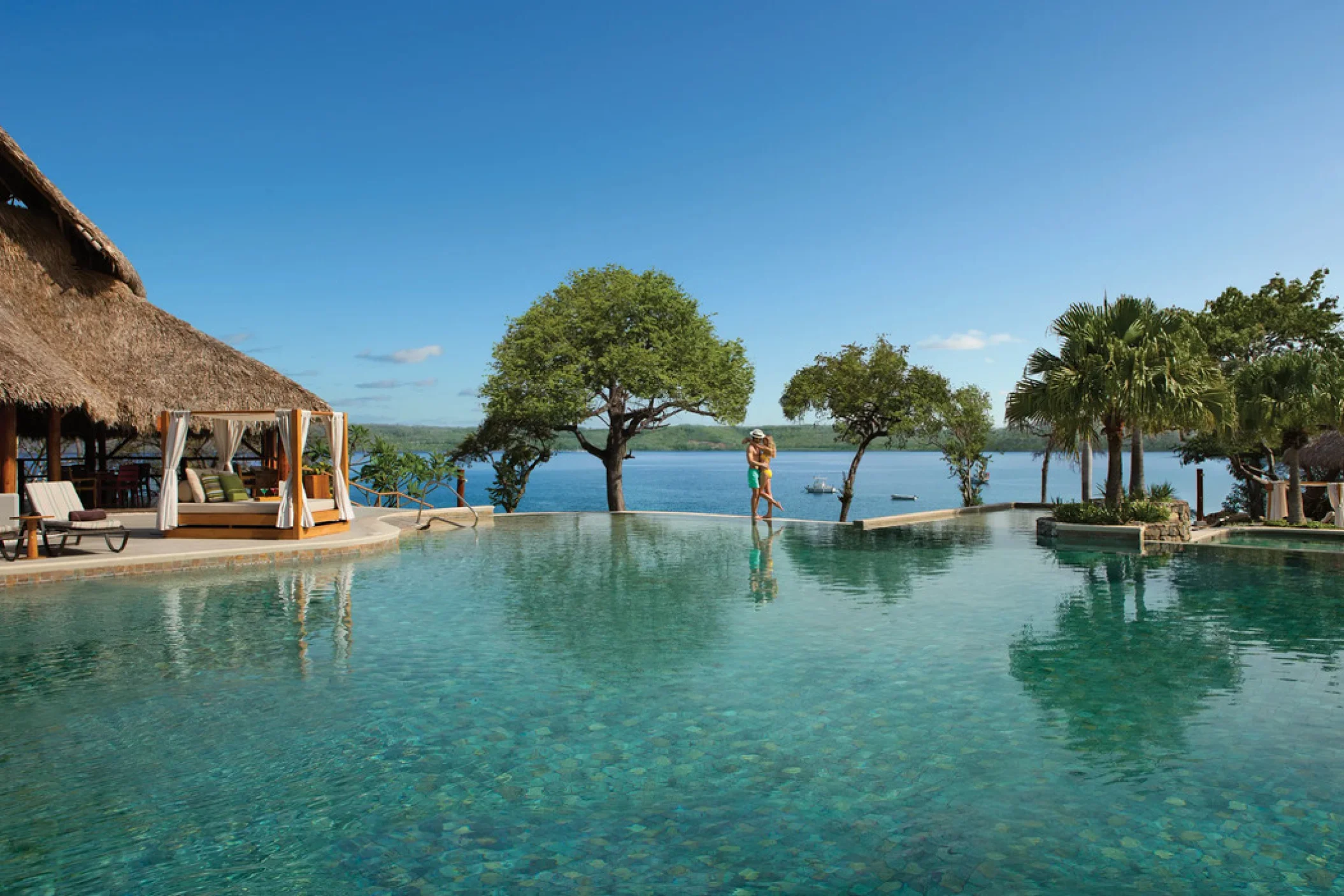 couple at the pool at Secrets Papagayo Costa Rica