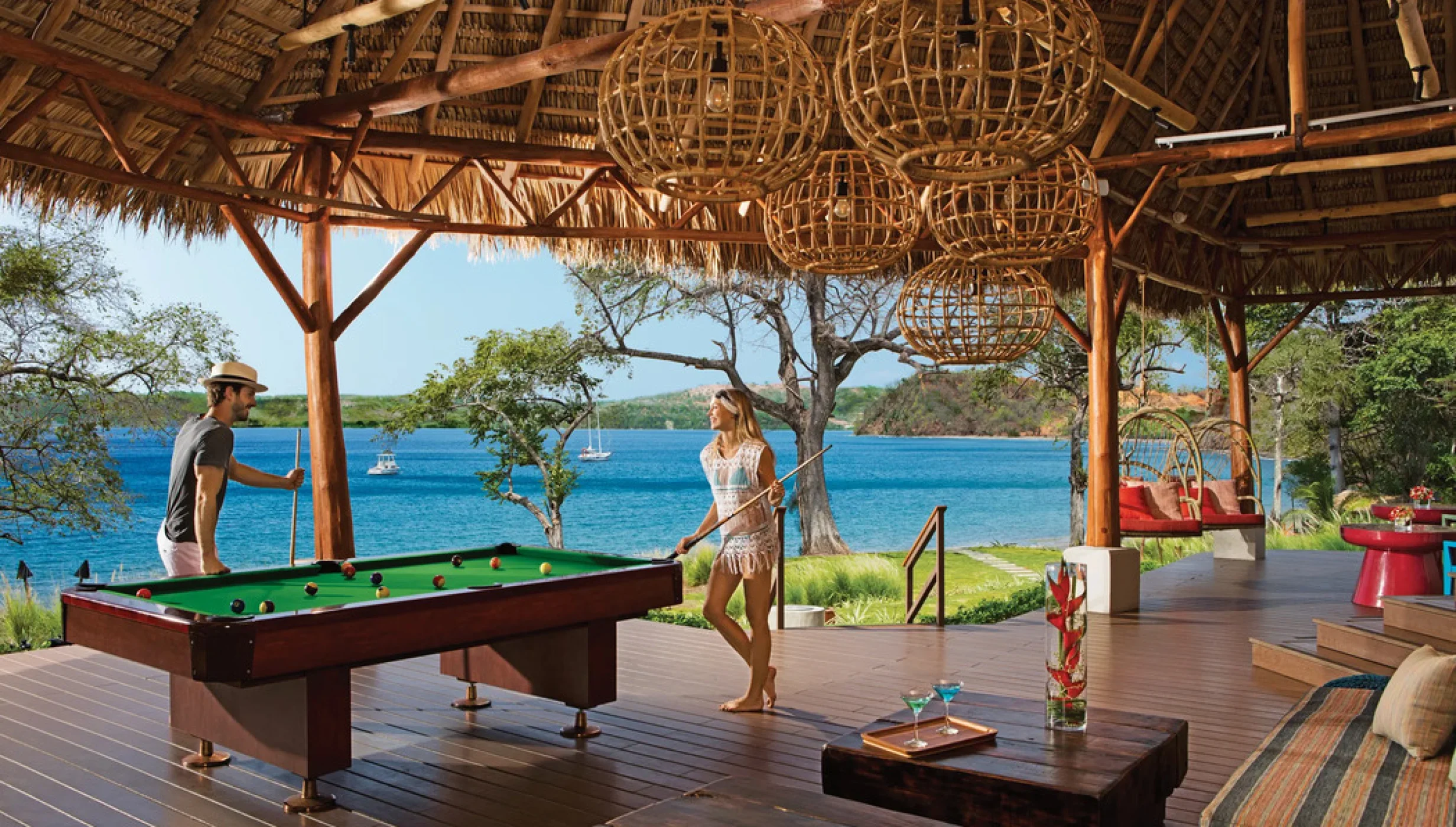 couple at the sugar reef bar at Secrets Papagayo Costa Rica