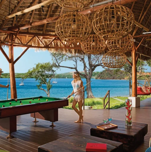 couple at the sugar reef bar at Secrets Papagayo Costa Rica