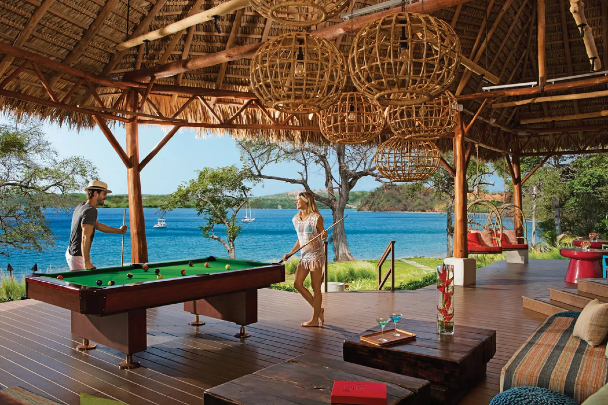 couple at the sugar reef bar at Secrets Papagayo Costa Rica