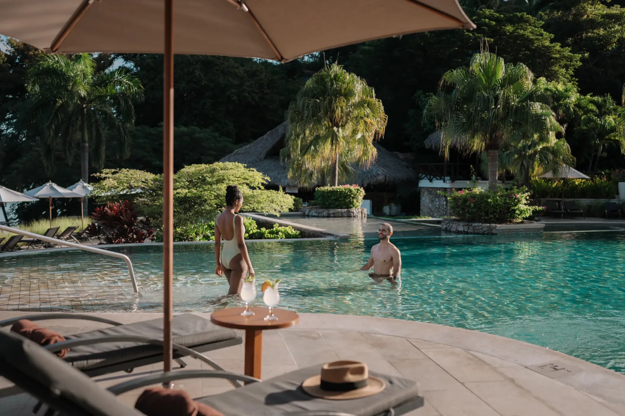 couple in the pool at Secrets Papagayo Costa Rica