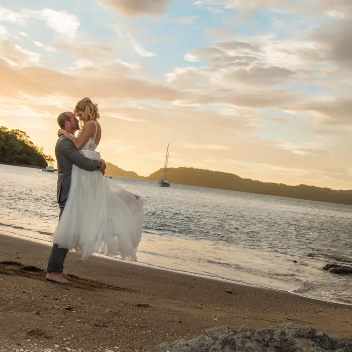groom and bride on the beach at Secrets Papagayo Costa Rica