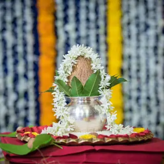 Traditional Indian wedding kalash with coconut and floral garlands at Secrets Papagayo, Costa Rica