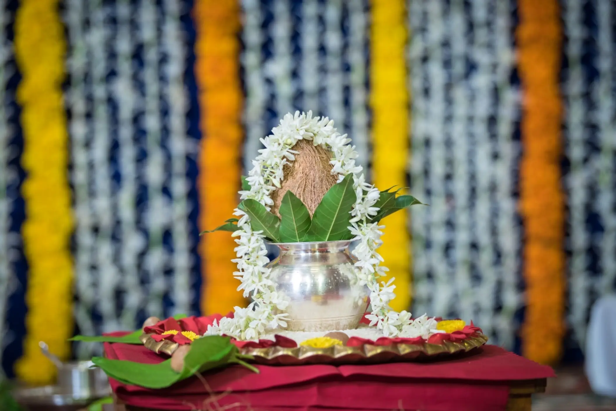 Traditional Indian wedding kalash with coconut and floral garlands at Secrets Papagayo, Costa Rica