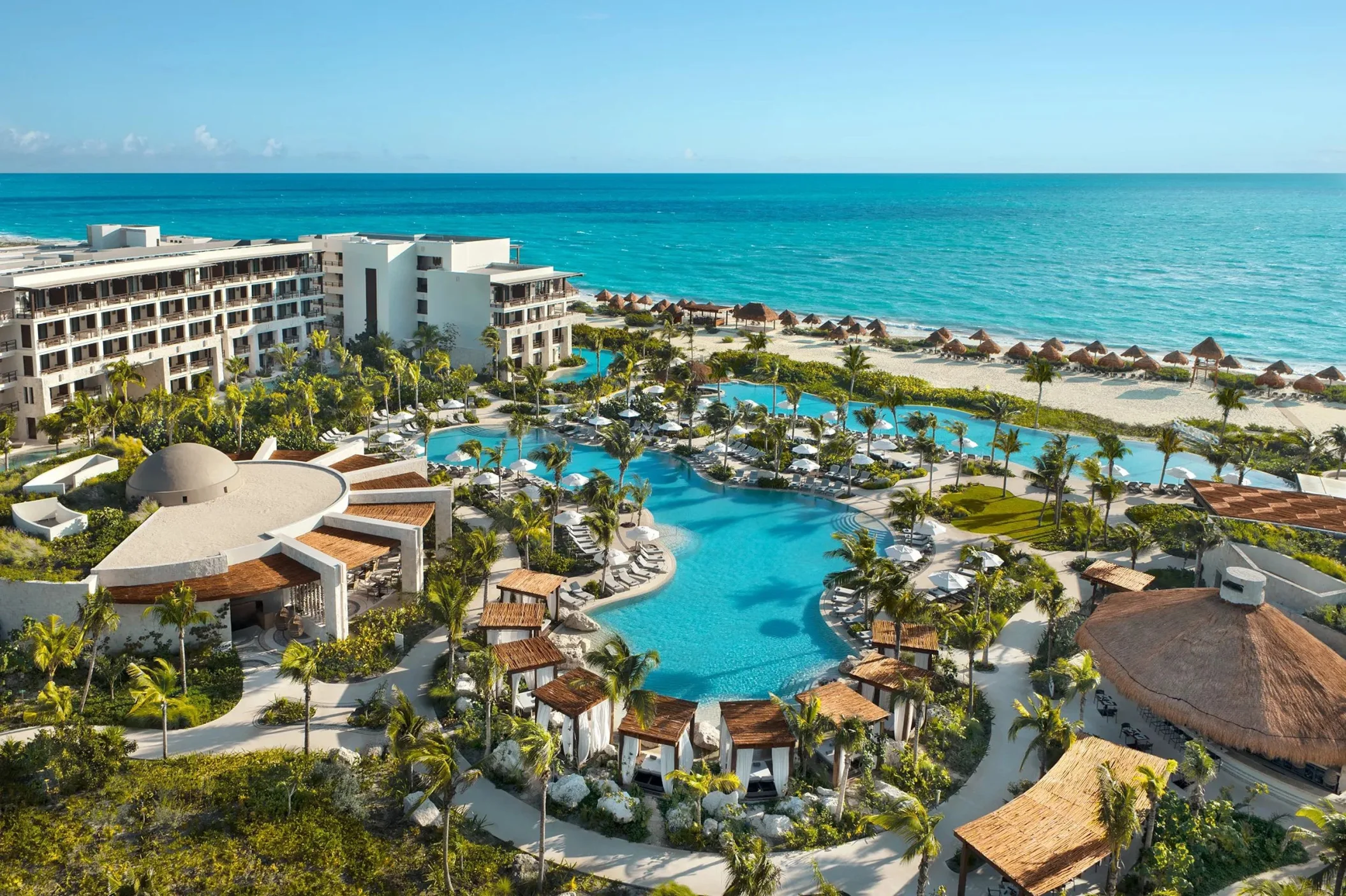 pools and buildings at Secrets Playa Blanca Costa Mujeres