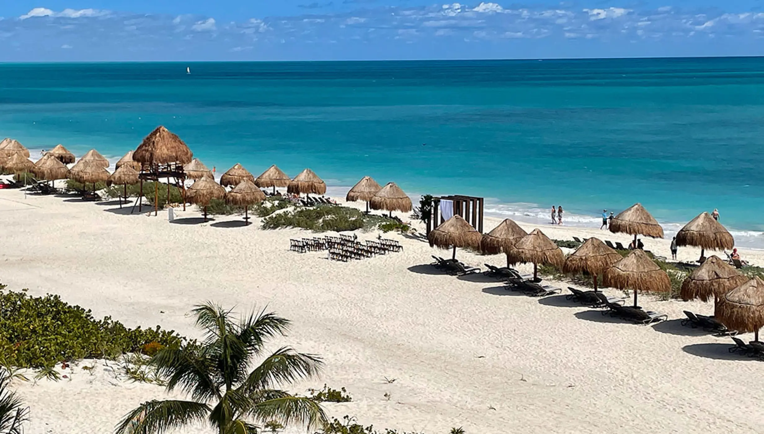 Beachfront wedding ceremony setup at Secrets Playa Blanca, Cancun