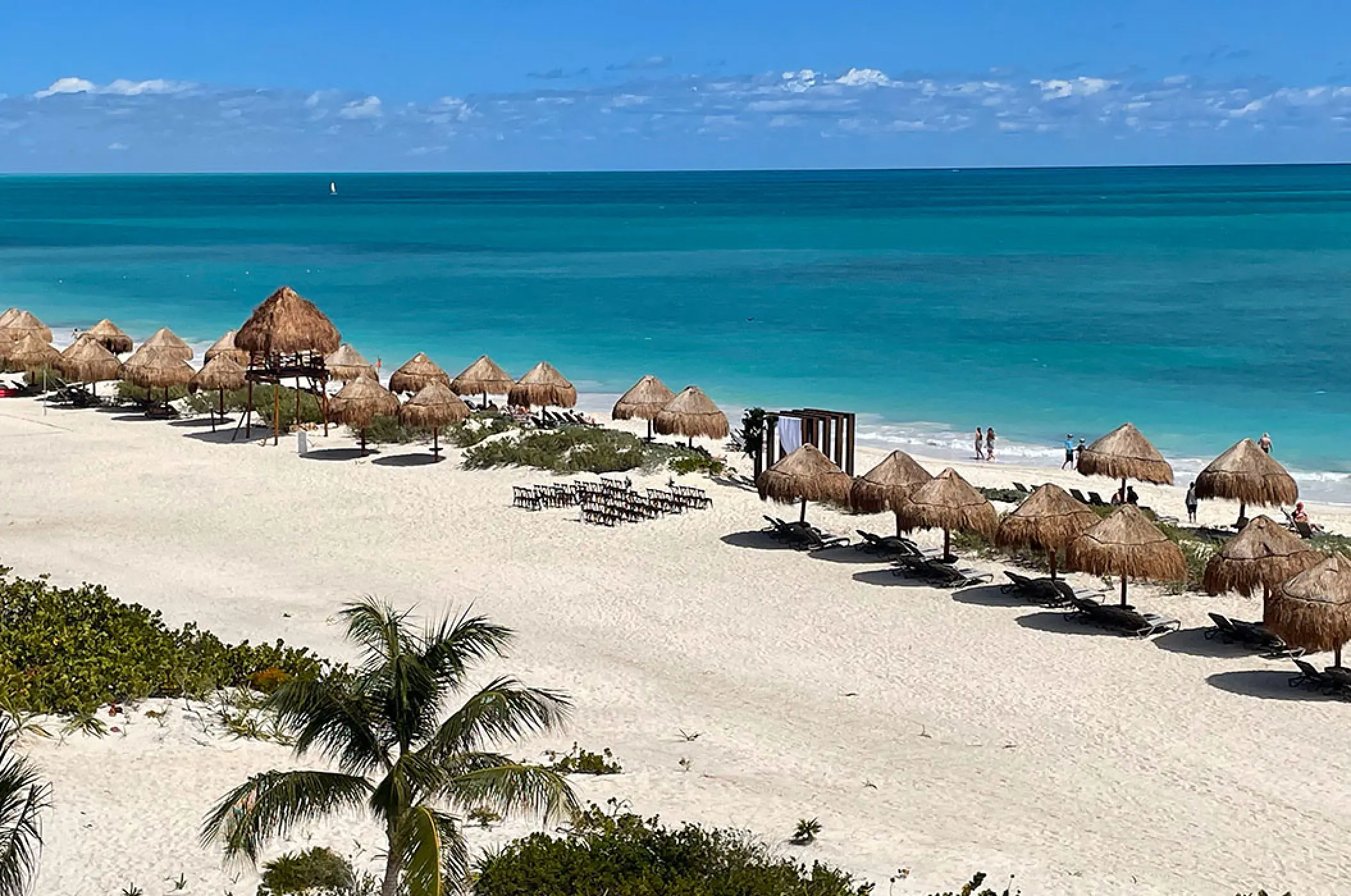 Beachfront wedding ceremony setup at Secrets Playa Blanca, Cancun