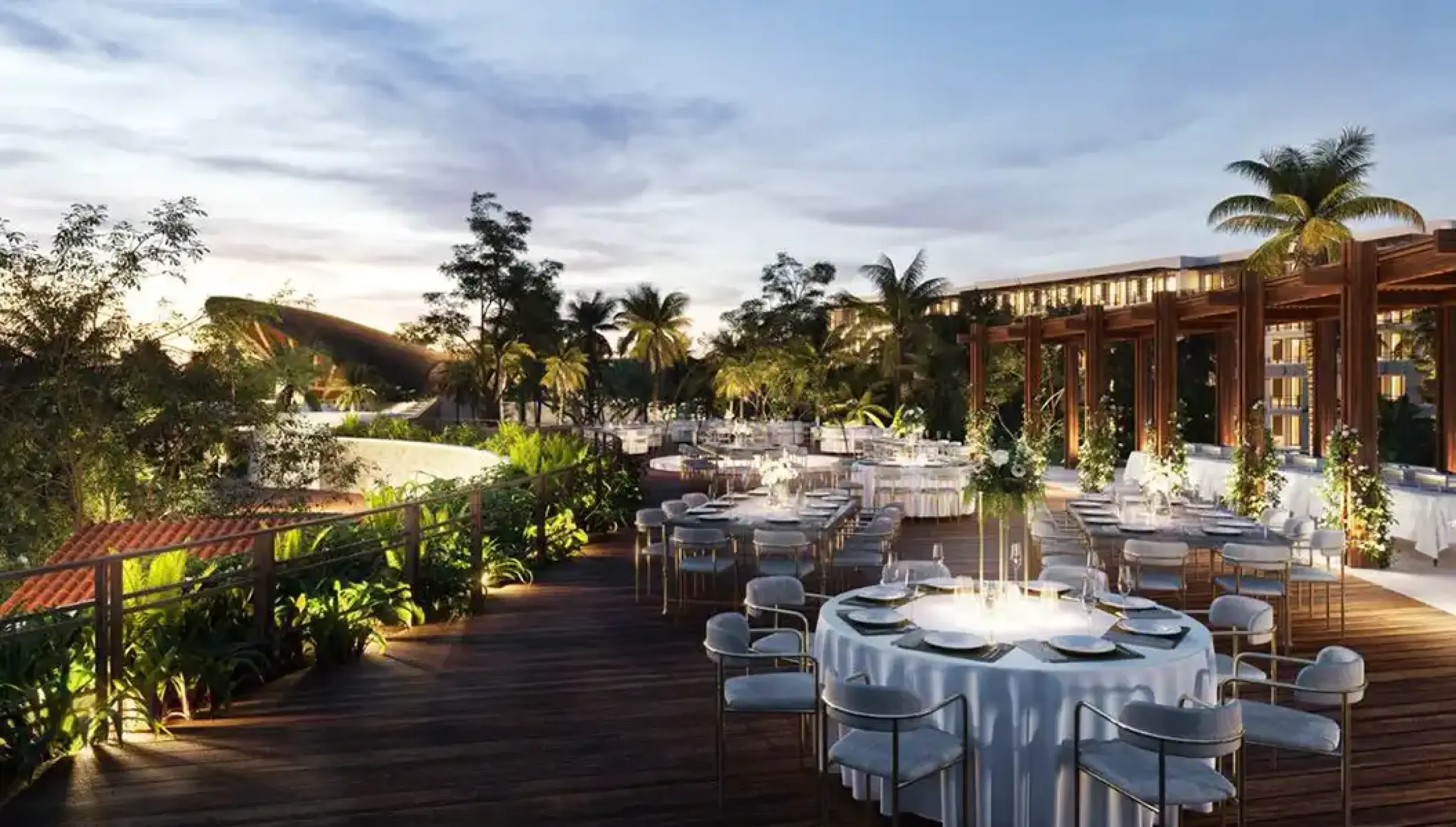 Rooftop wedding reception setup on a wooden terrace at Secrets Playa Blanca, Cancun
