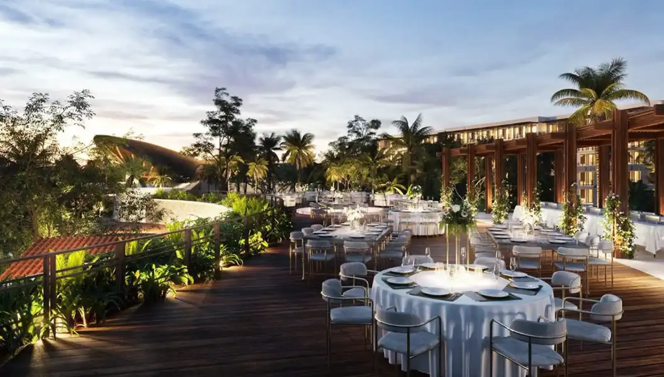 Rooftop wedding reception setup on a wooden terrace at Secrets Playa Blanca, Cancun
