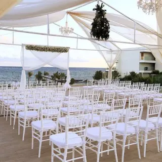 Rooftop wedding ceremony under a draped canopy at Secrets Riviera Cancun, Riviera Maya