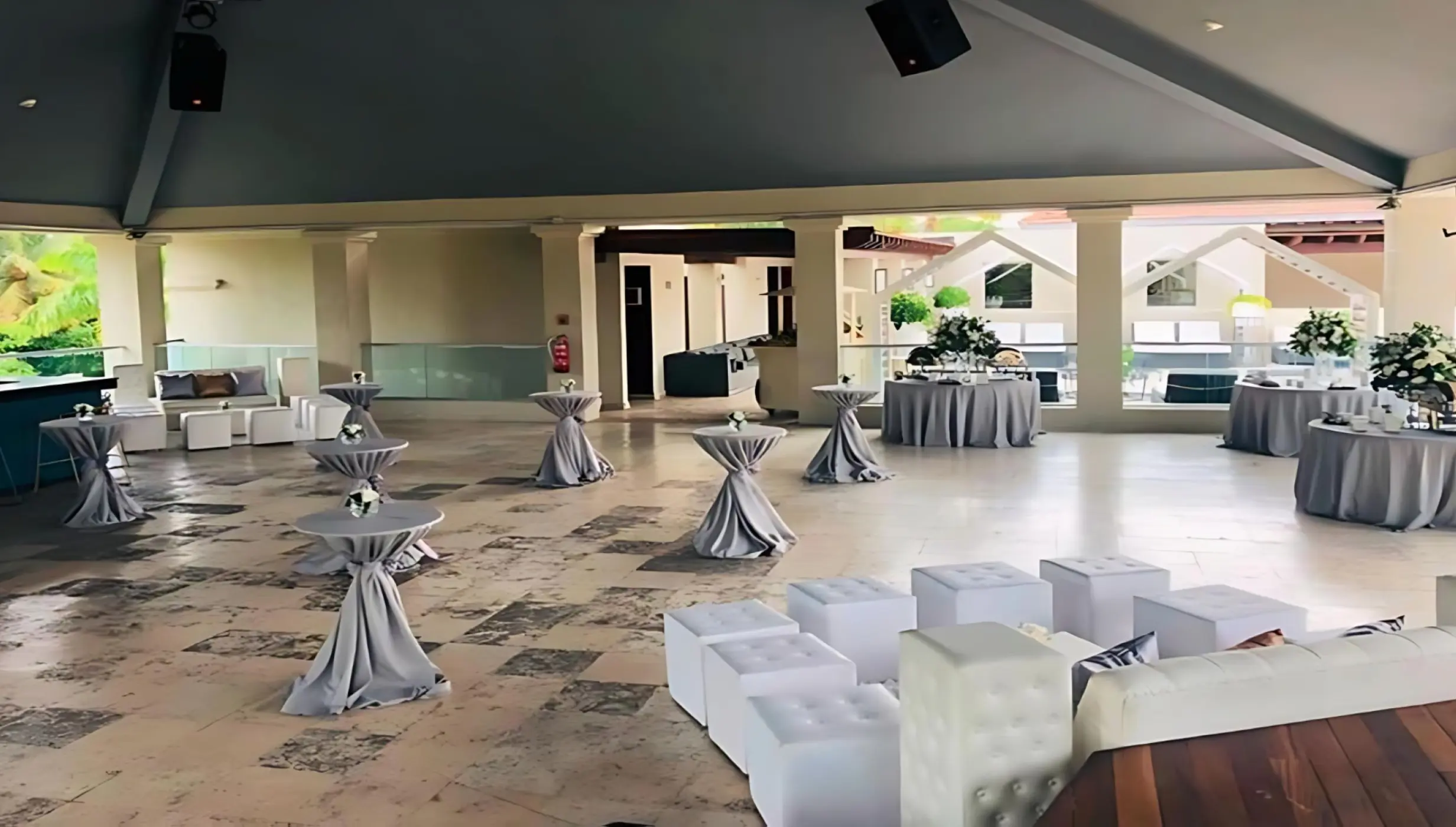 Eclipse Nightclub wedding reception setup with cocktail tables and lounge seating at Secrets Royal Beach, Punta Cana