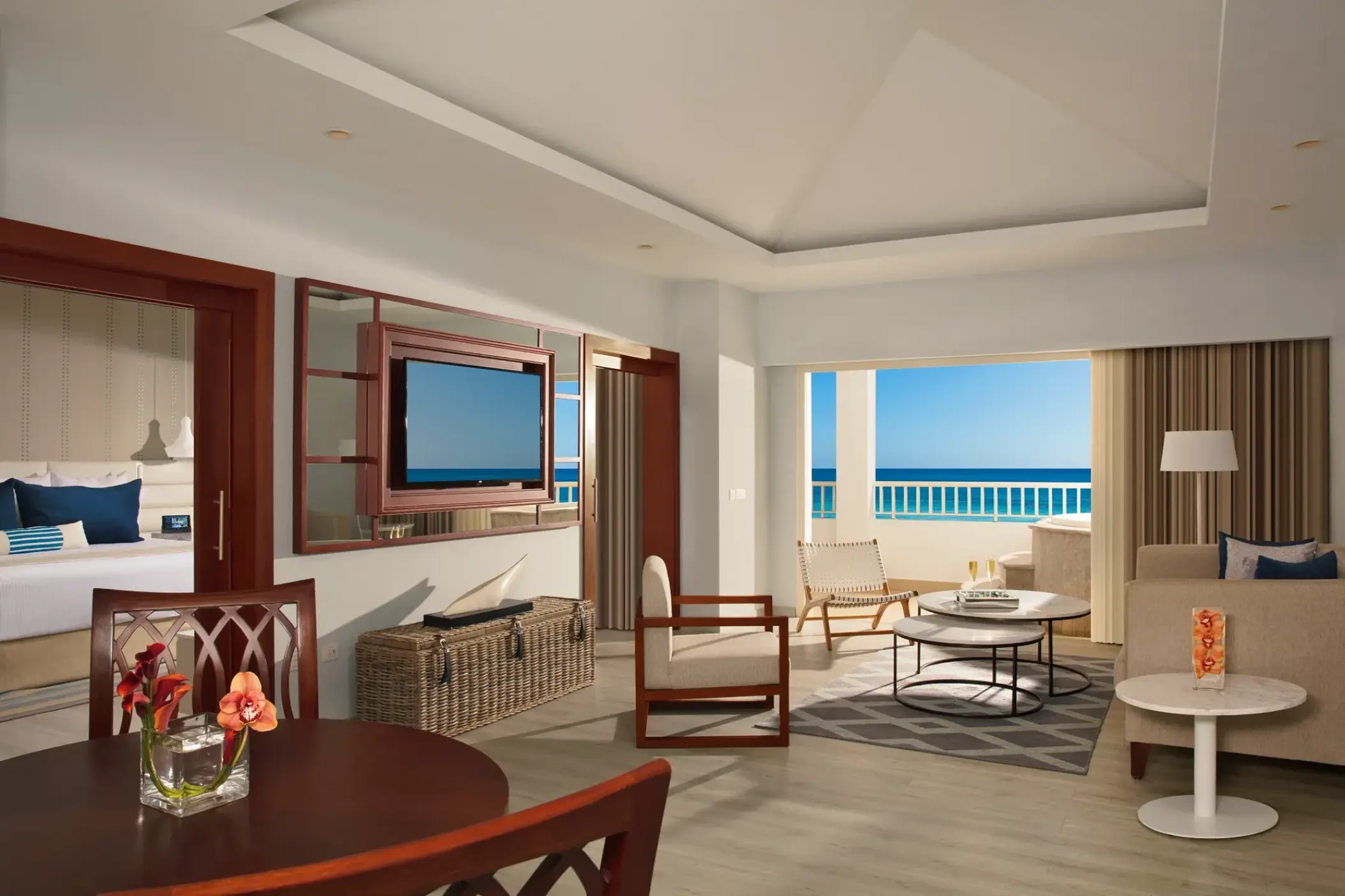 Preferred Club Master Suite living area with oceanfront balcony at Secrets St James, Montego Bay