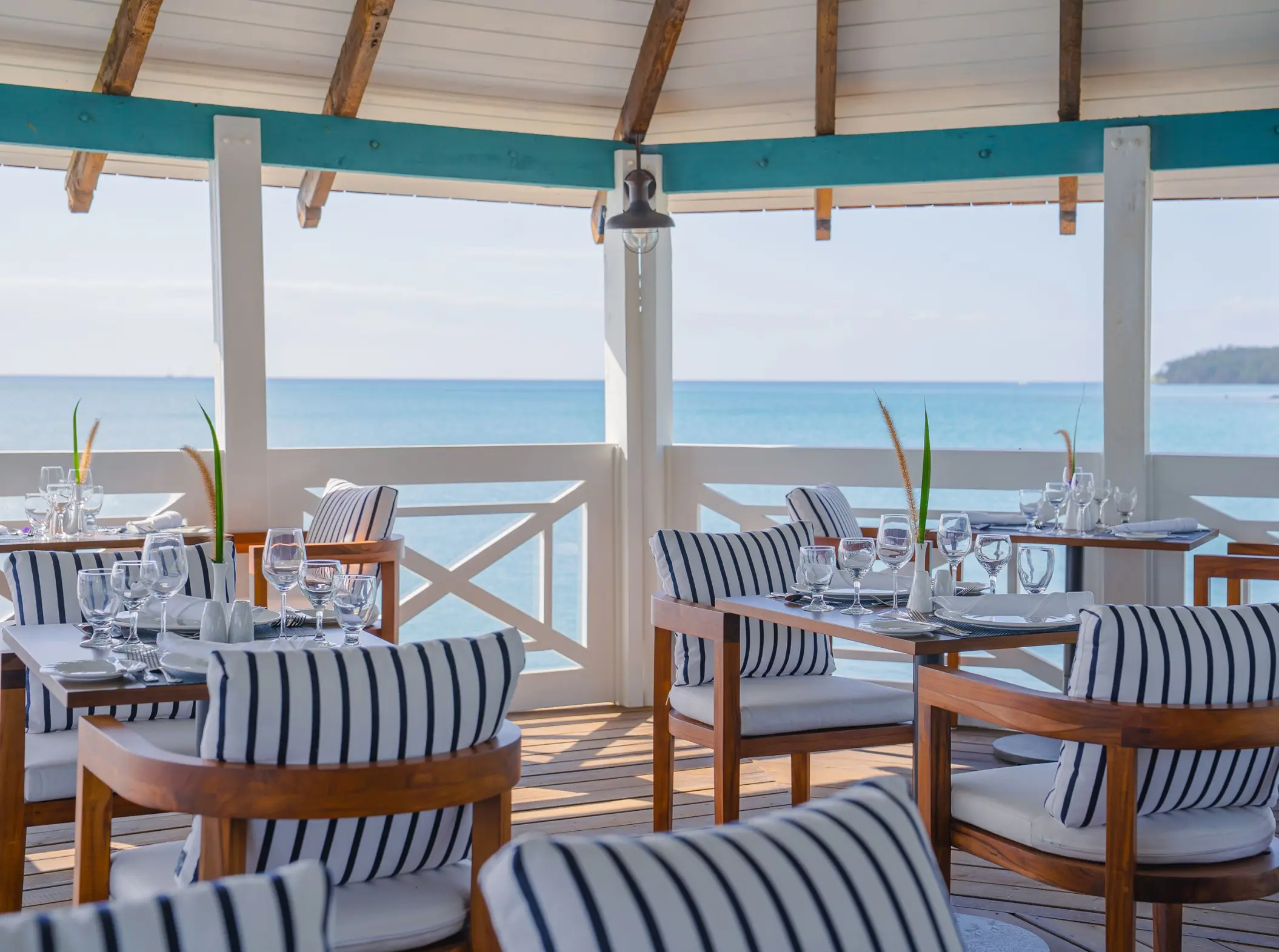 Outdoor seating at Bordeaux restaurant overlooking the ocean at Secrets St. Lucia, Castries