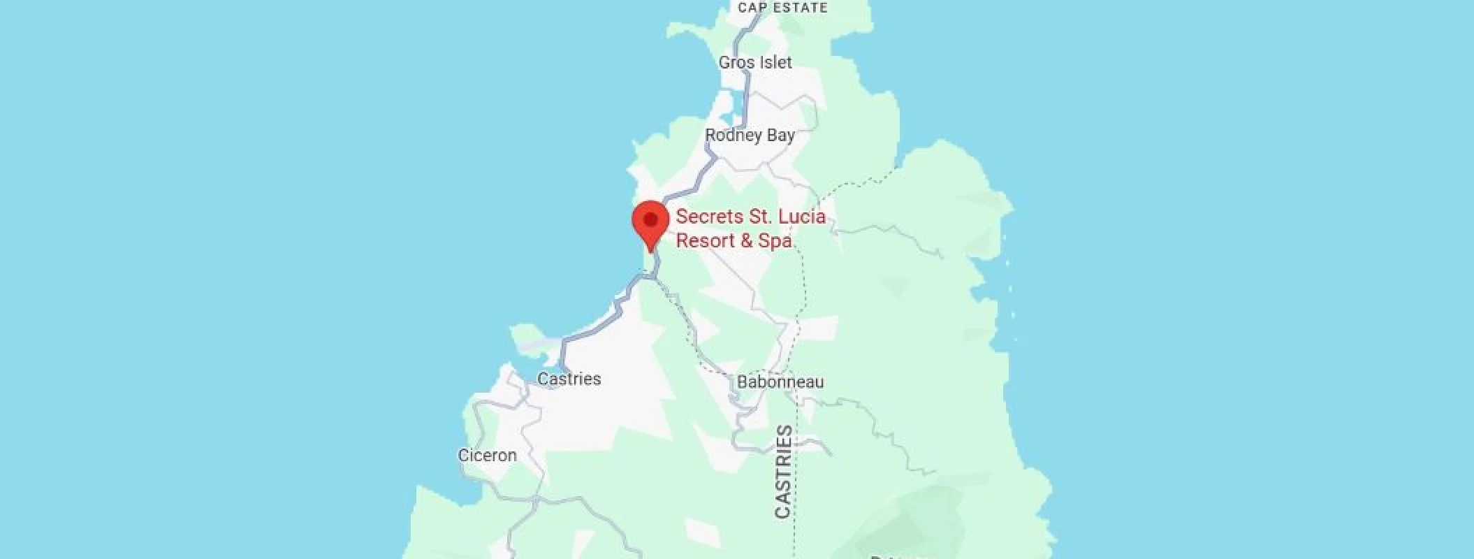 A map of Saint Lucia with a red marker indicating the location of Secrets St. Lucia Resort & Spa.