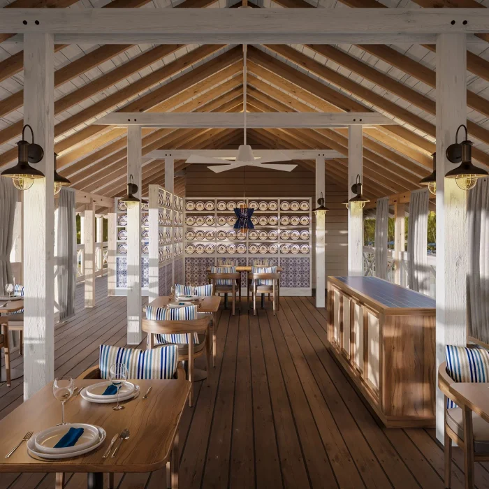 An elegant open-air restaurant and venue on a pier, with a bar and views of the sea.