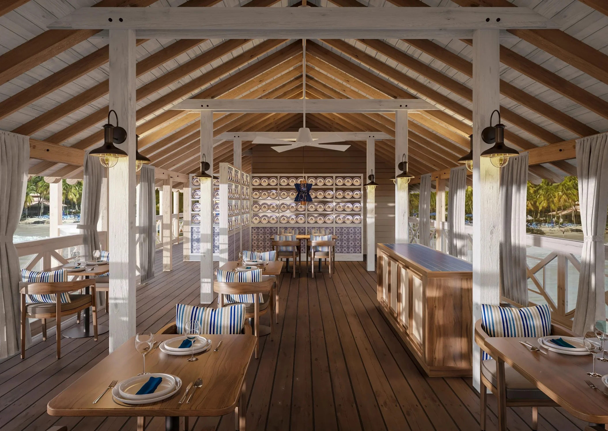An elegant open-air restaurant and venue on a pier, with a bar and views of the sea.