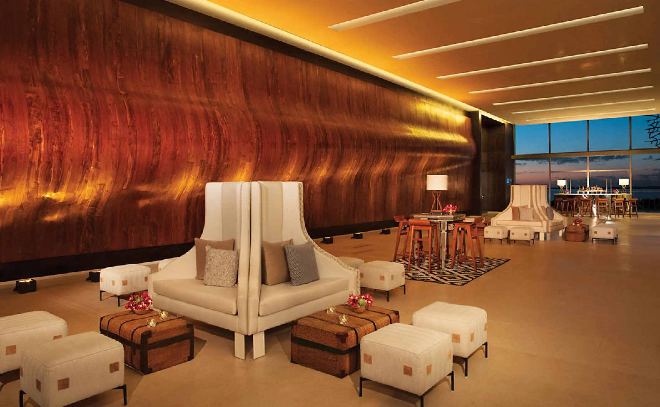 Modern lounge seating in the convention center foyer at Secrets The Vine, Cancun
