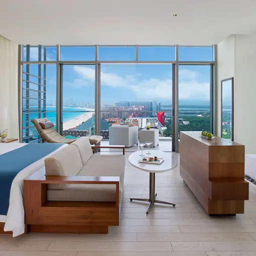 Honeymoon suite with floor-to-ceiling ocean views at Secrets The Vine, Cancun