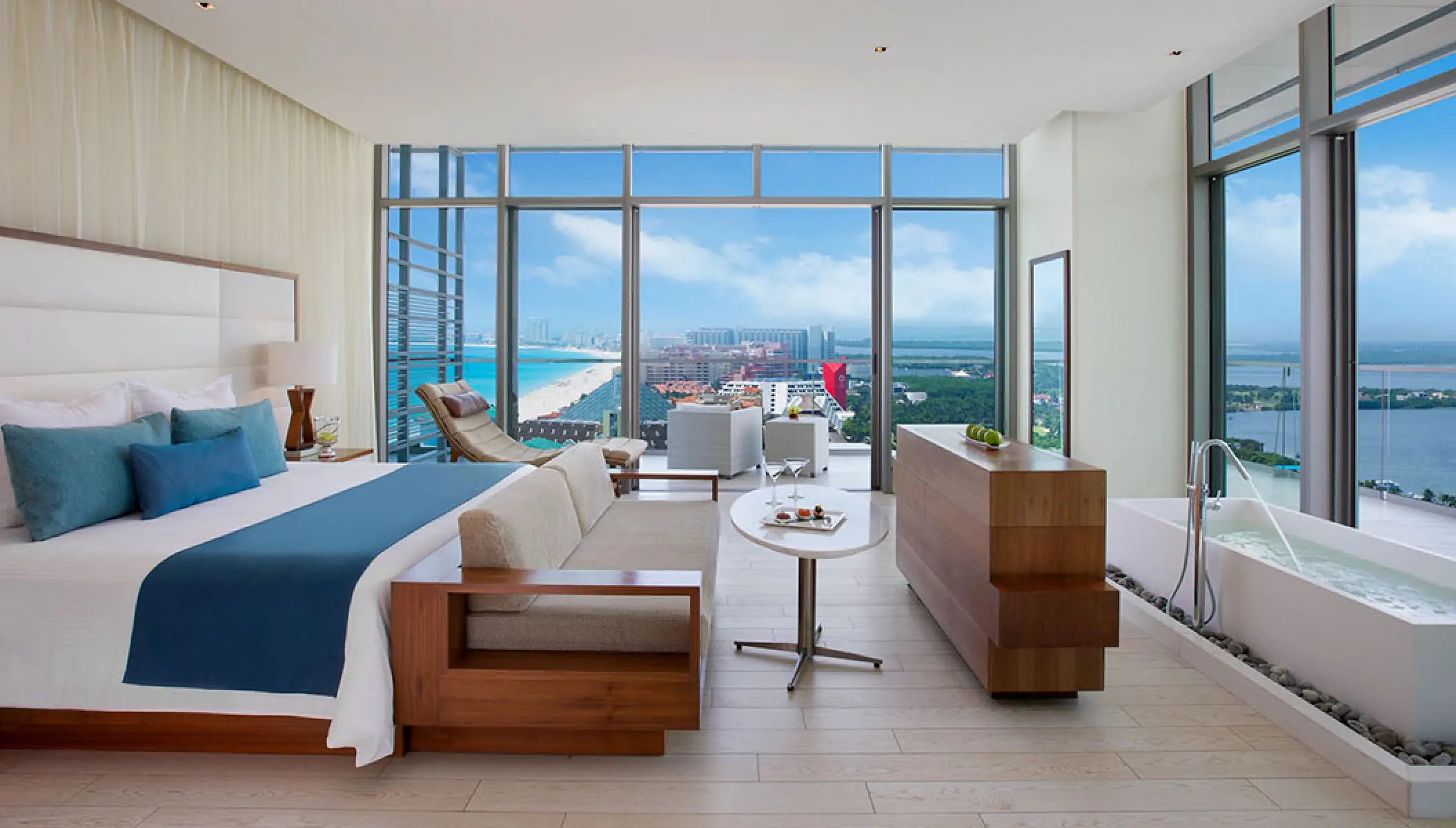 Honeymoon suite with floor-to-ceiling ocean views at Secrets The Vine, Cancun