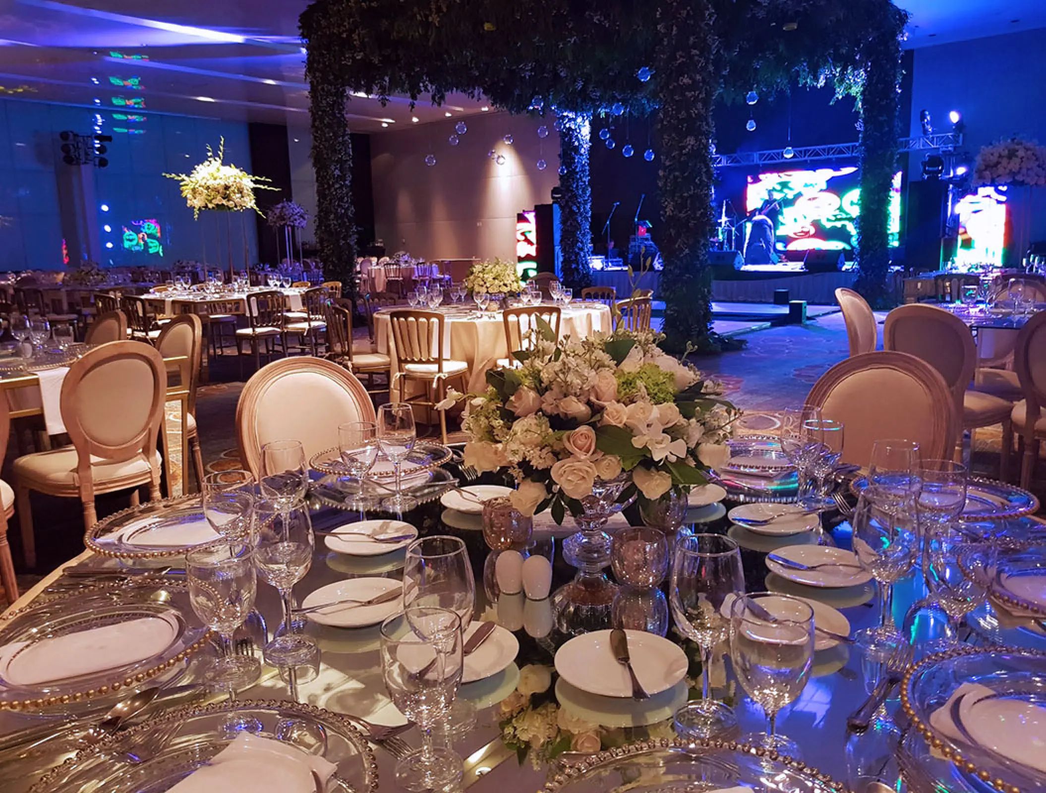Indoor ballroom wedding reception at Secrets The Vine, Cancun