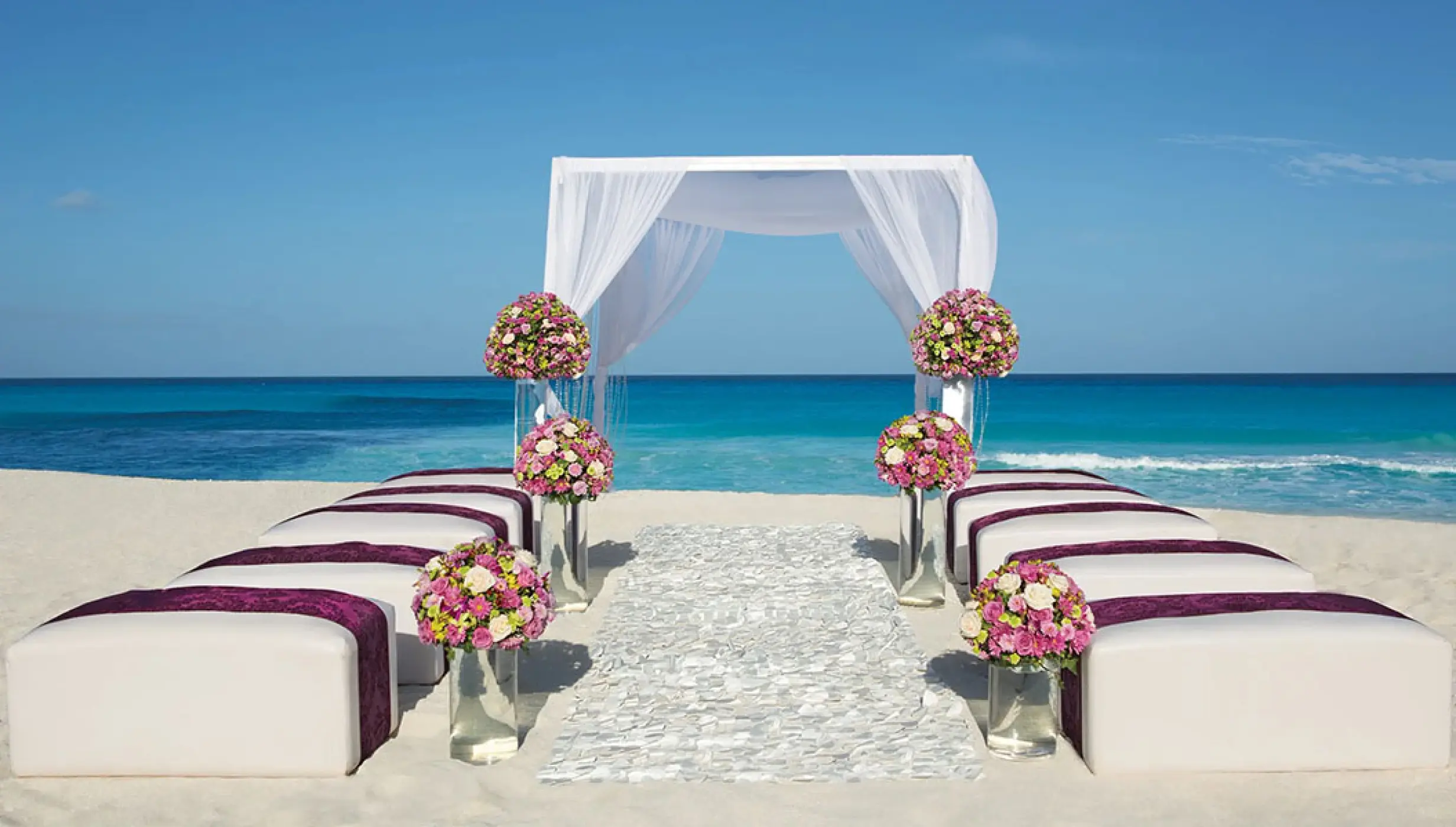Beach Wedding setup at Secrets The Vine Cancun.
