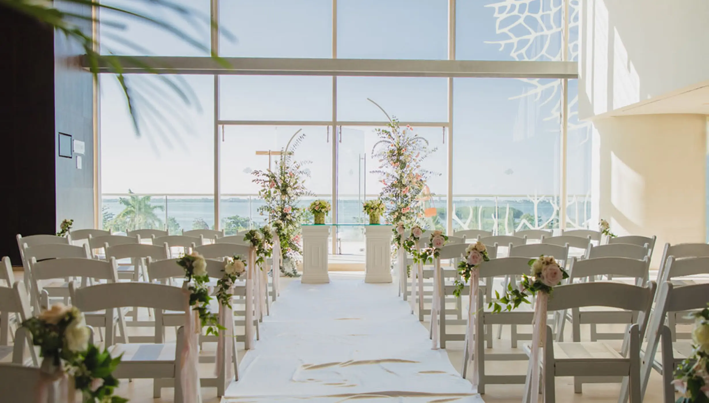 Wedding ceremony setup at Convention Center Foyer in Secrets The Vine Cancun.