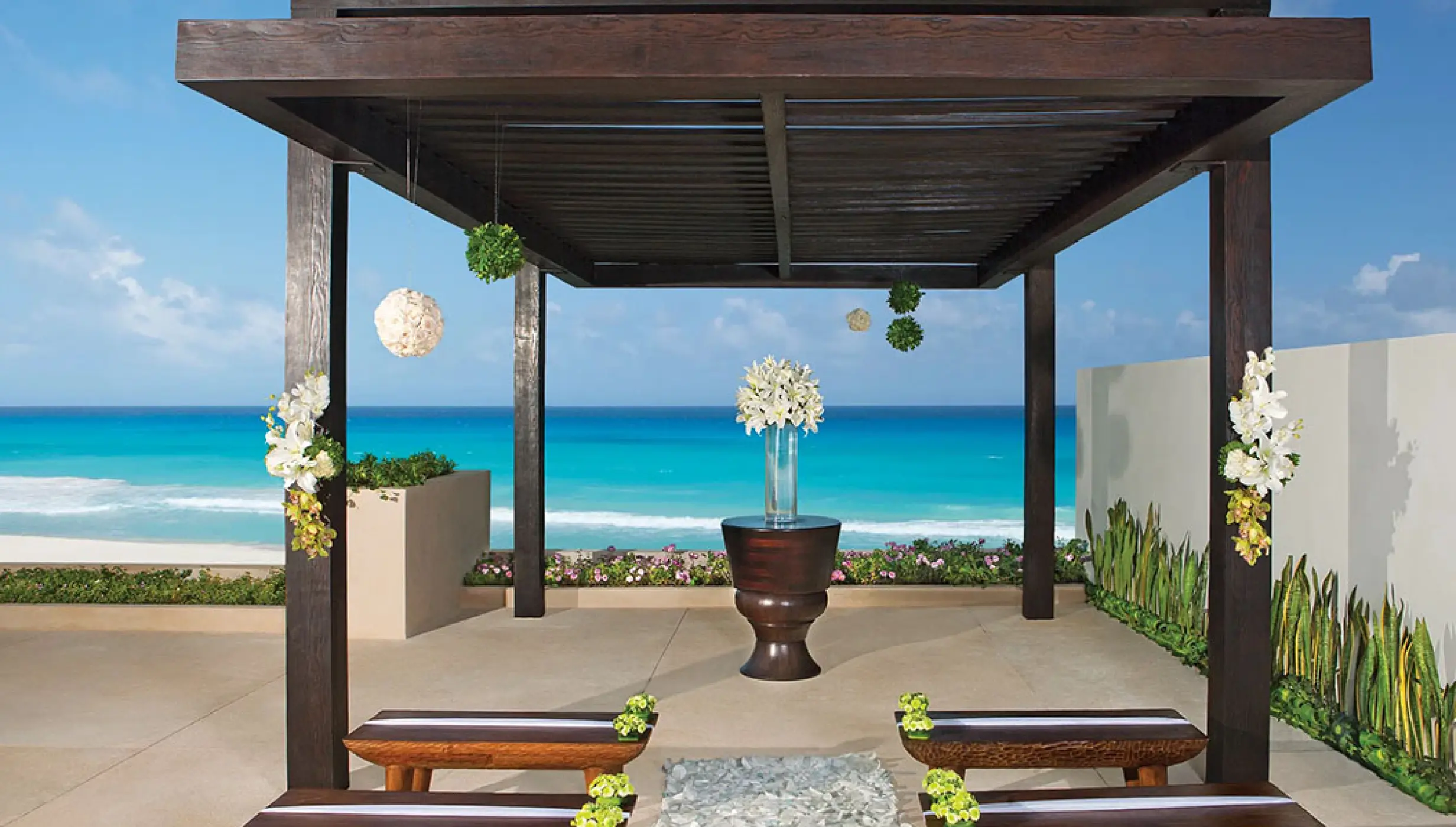 Ceremony setup at Gazebo wedding venue at Secrets The Vine Cancun.