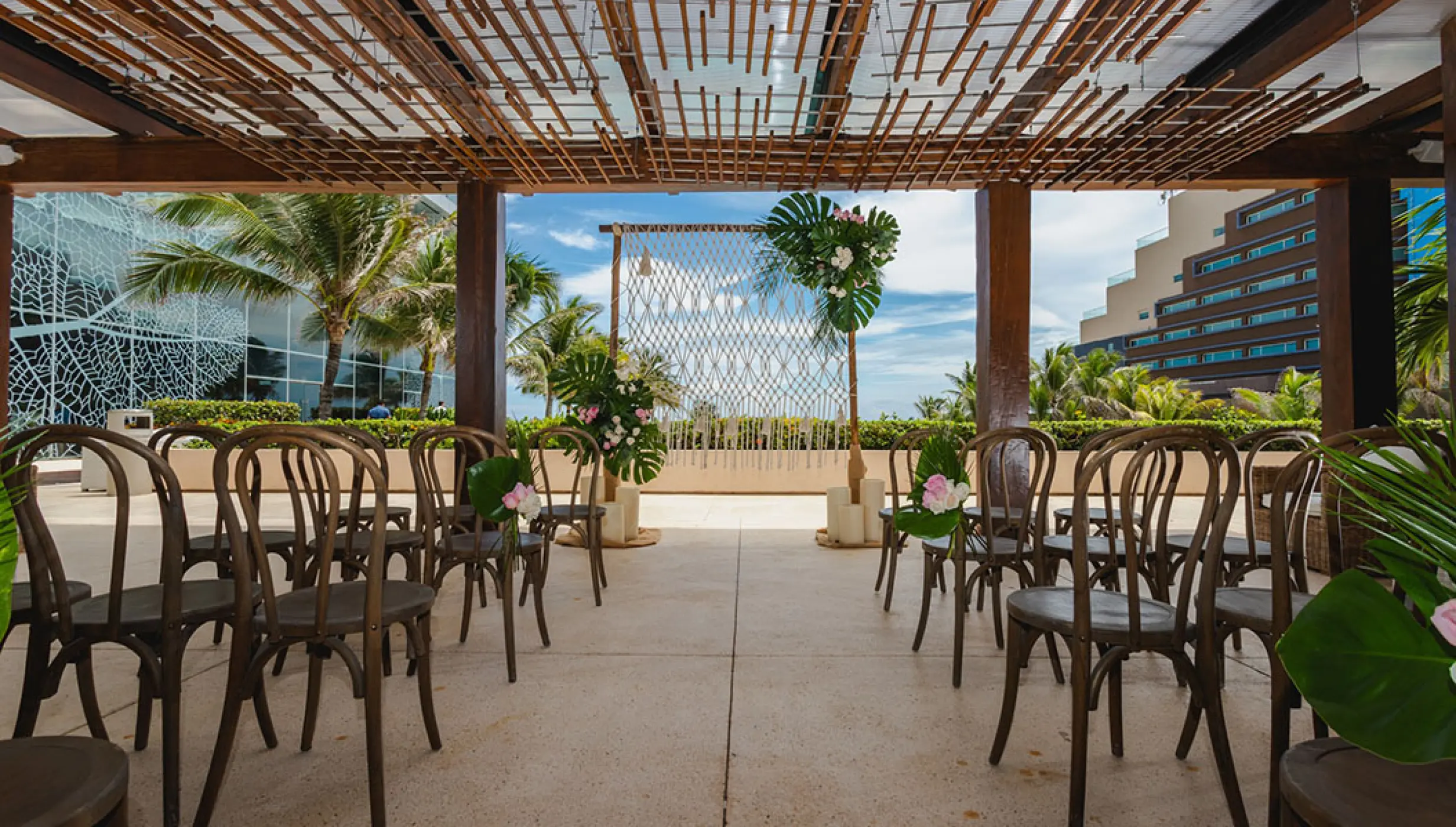Ceremony setup at The Vine Terrace wedding venue at Secrets The Vine Cancun.