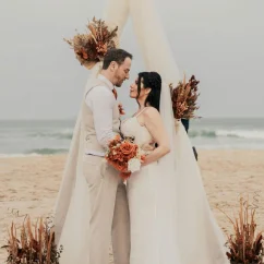 groom and bride on the beach