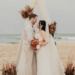 groom and bride on the beach