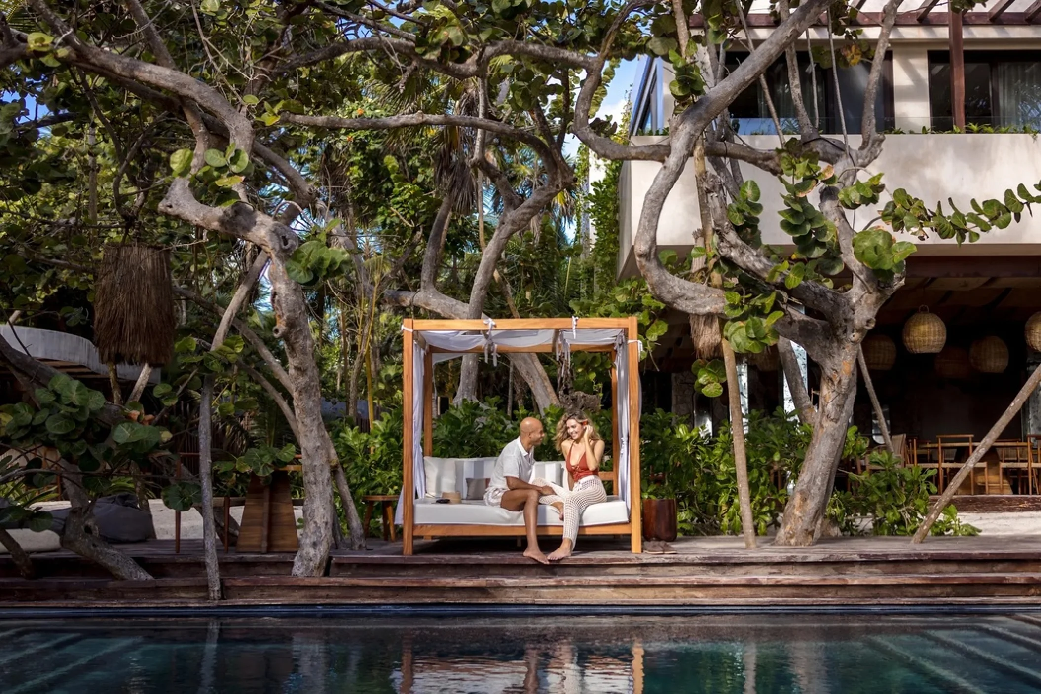 couple at the beach club pool at Secrets Tulum