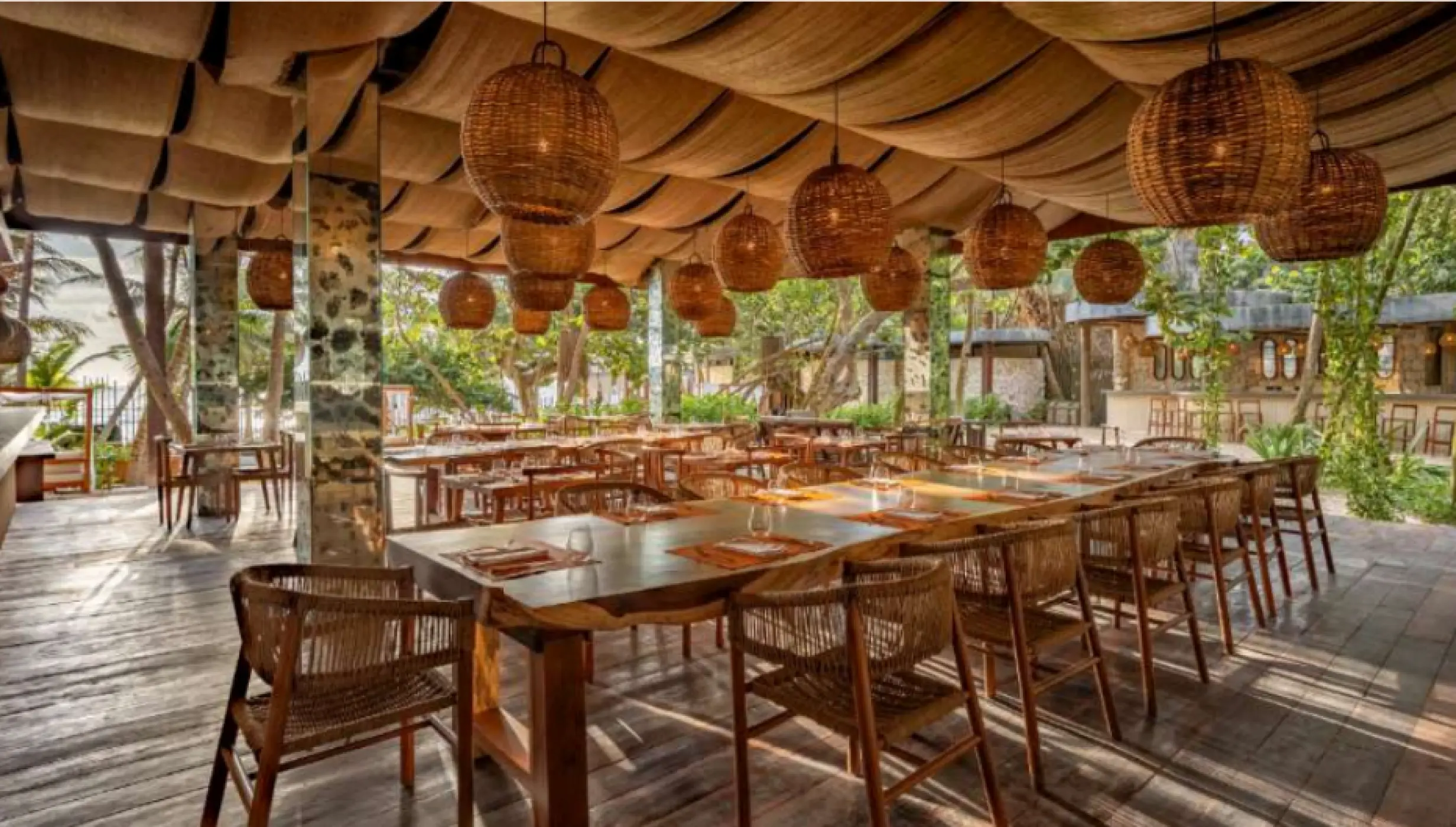 Boho-style seaside restaurant reception venue at Secrets Tulum, Tulum