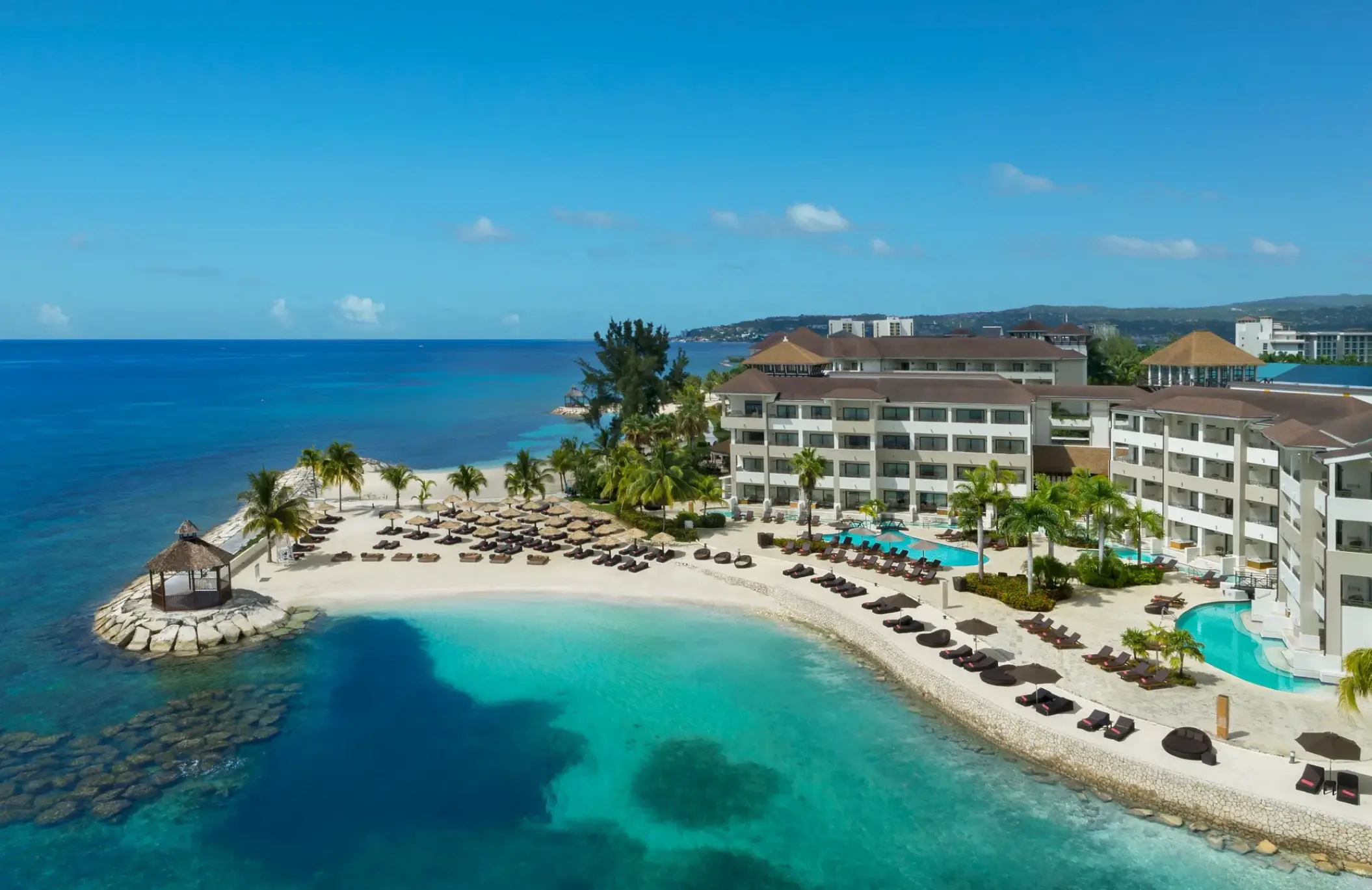 Secrets Wild Orchid Montego Bay aerial beach view and pools, Montego Bay