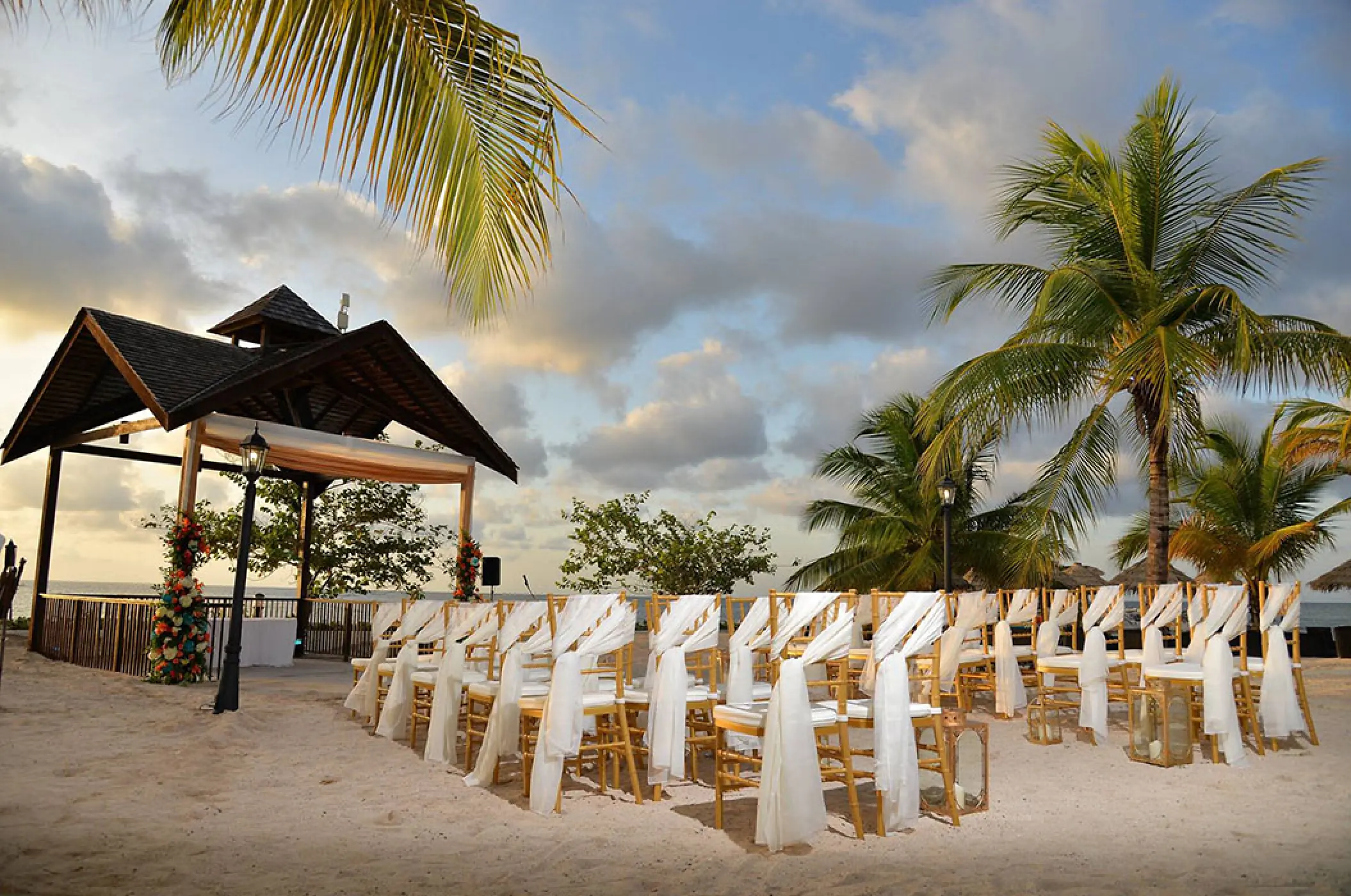 Beachfront wedding ceremony setup at Secrets St James, Montego Bay