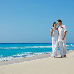 Ceremony setup on the Barracuda beach venue at Secrets Wild Orchid.